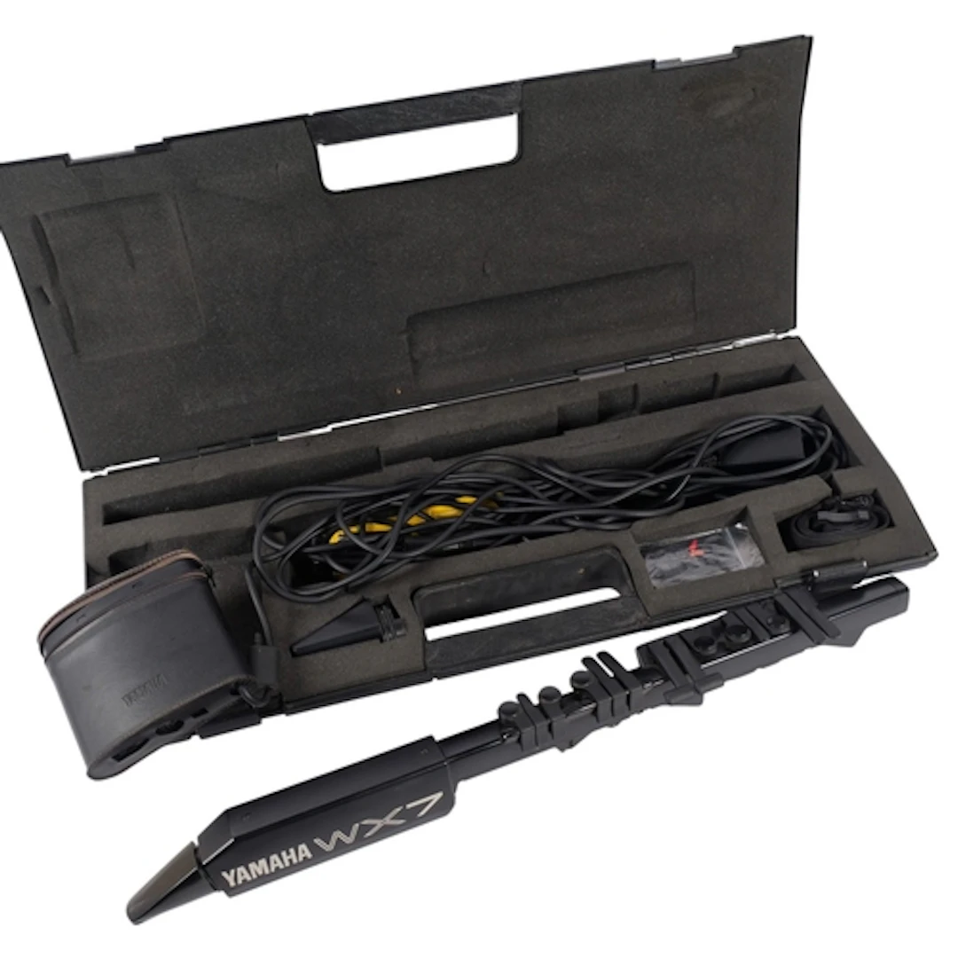 A Yamaha WX7 wind synthesizer, with accessories, cased