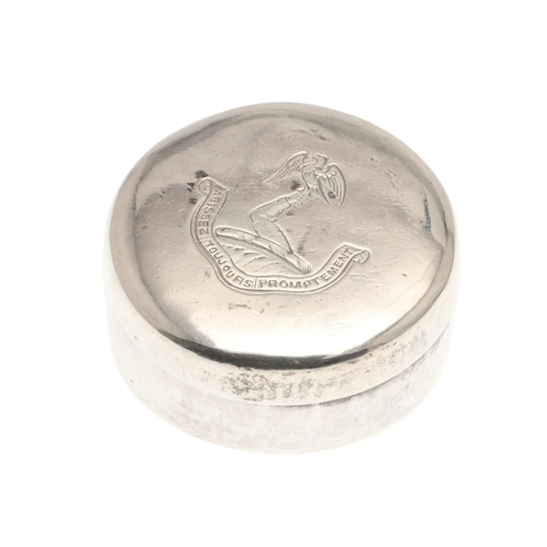 A CHARLES II SILVER PATCH BOX. Of plain circular form, the c...