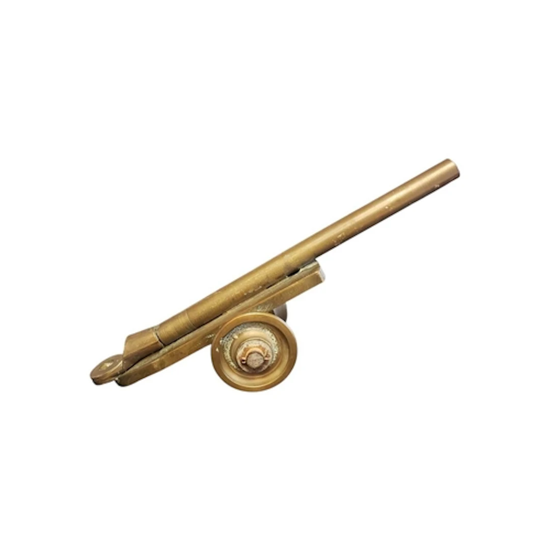 1957 trench art brass model cannon by M. Turner. Features a ...