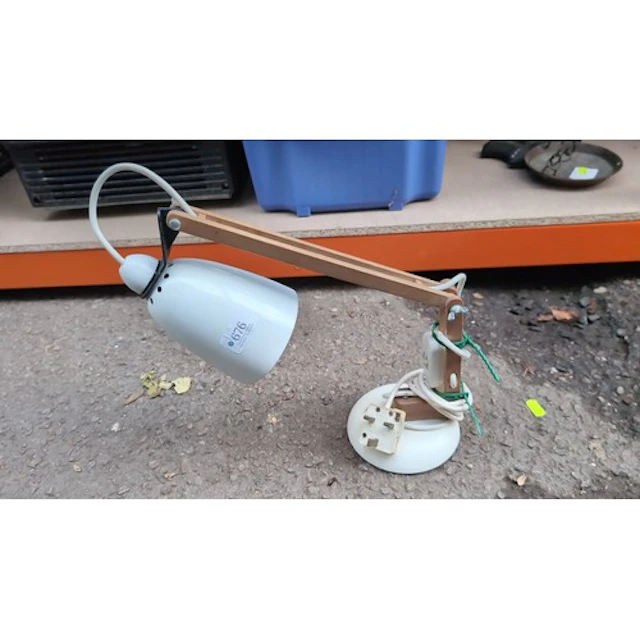 Adjustable desk lamp with a white enamelled metal shade and ...