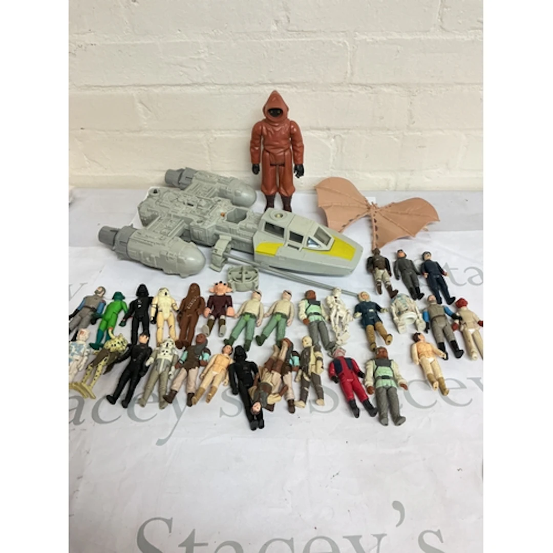 A Collection Of Vintage Star Wars Figures And Accessories.