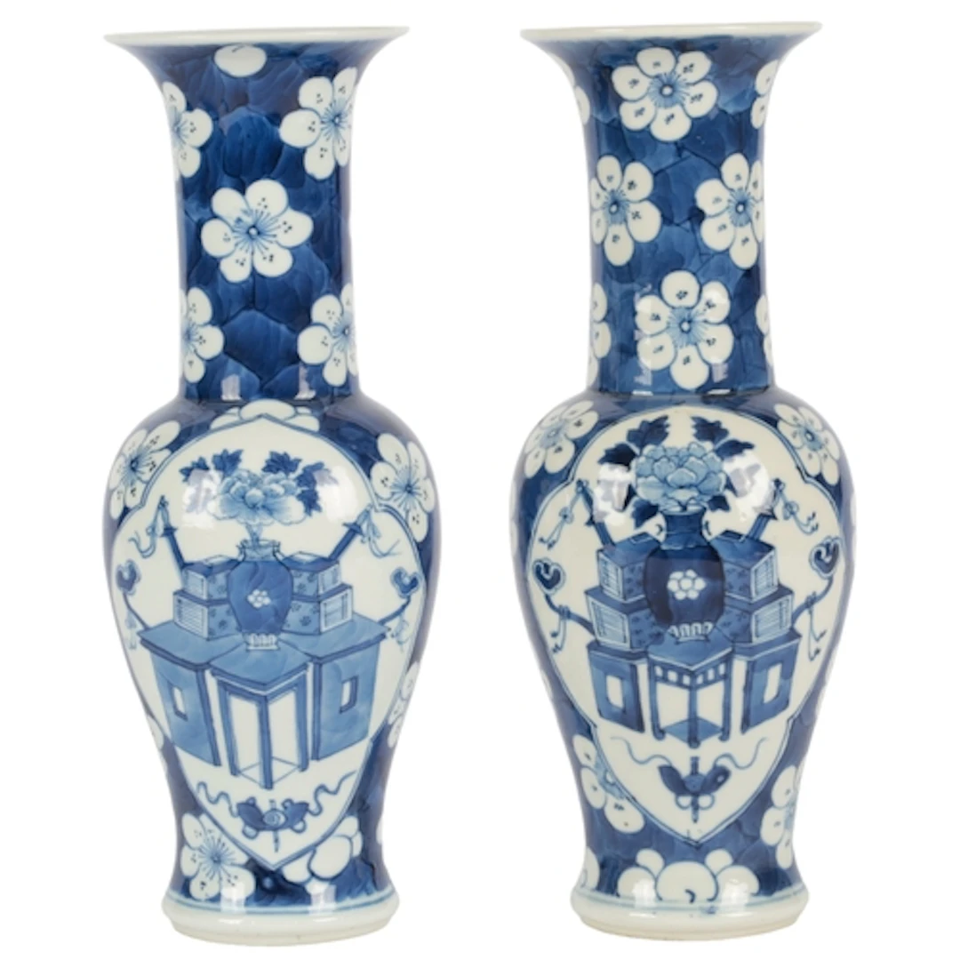 A pair of Chinese blue and white 'Antiques' vases, Kangxi ma...