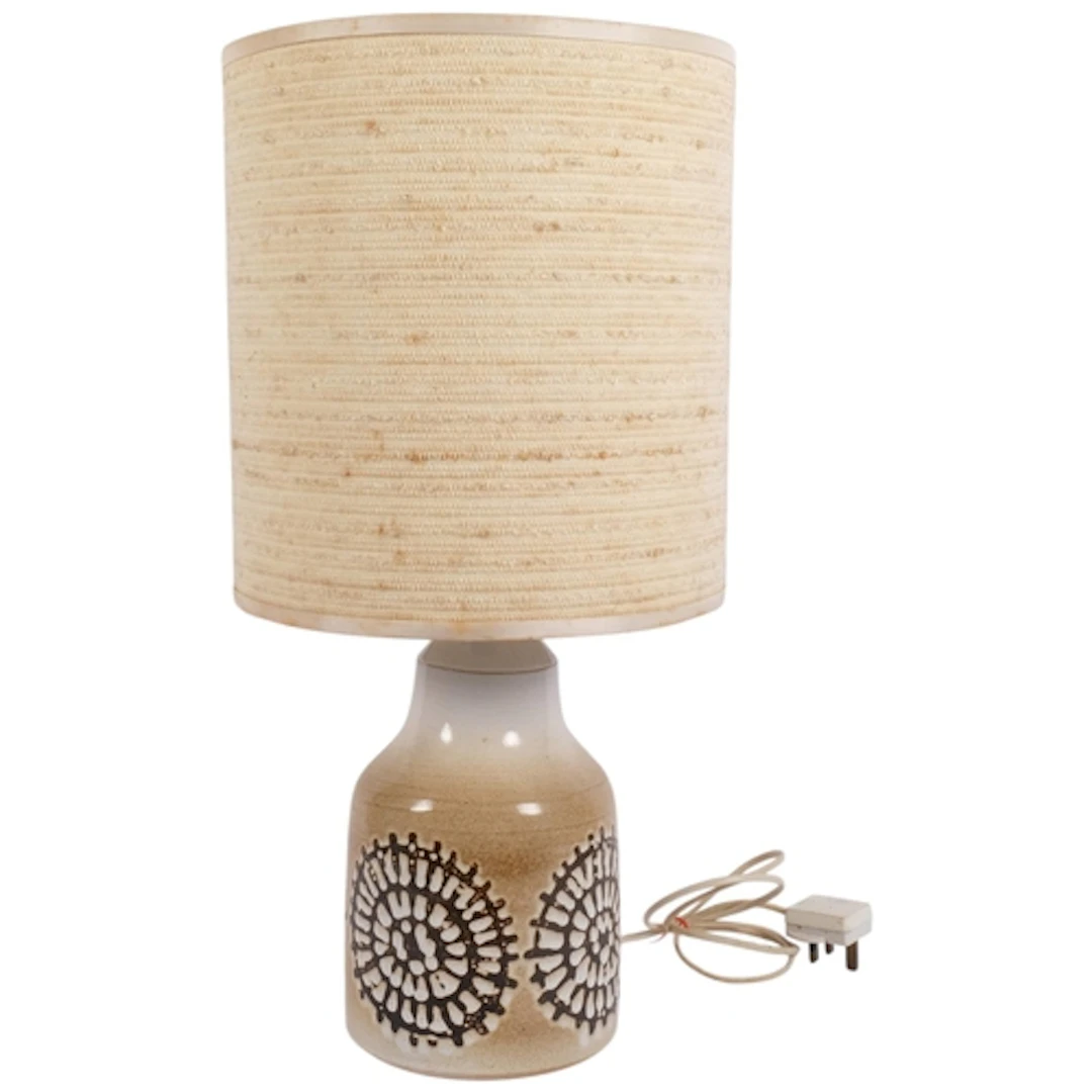 A retro Iden Pottery table lamp, with embossed and painted d...