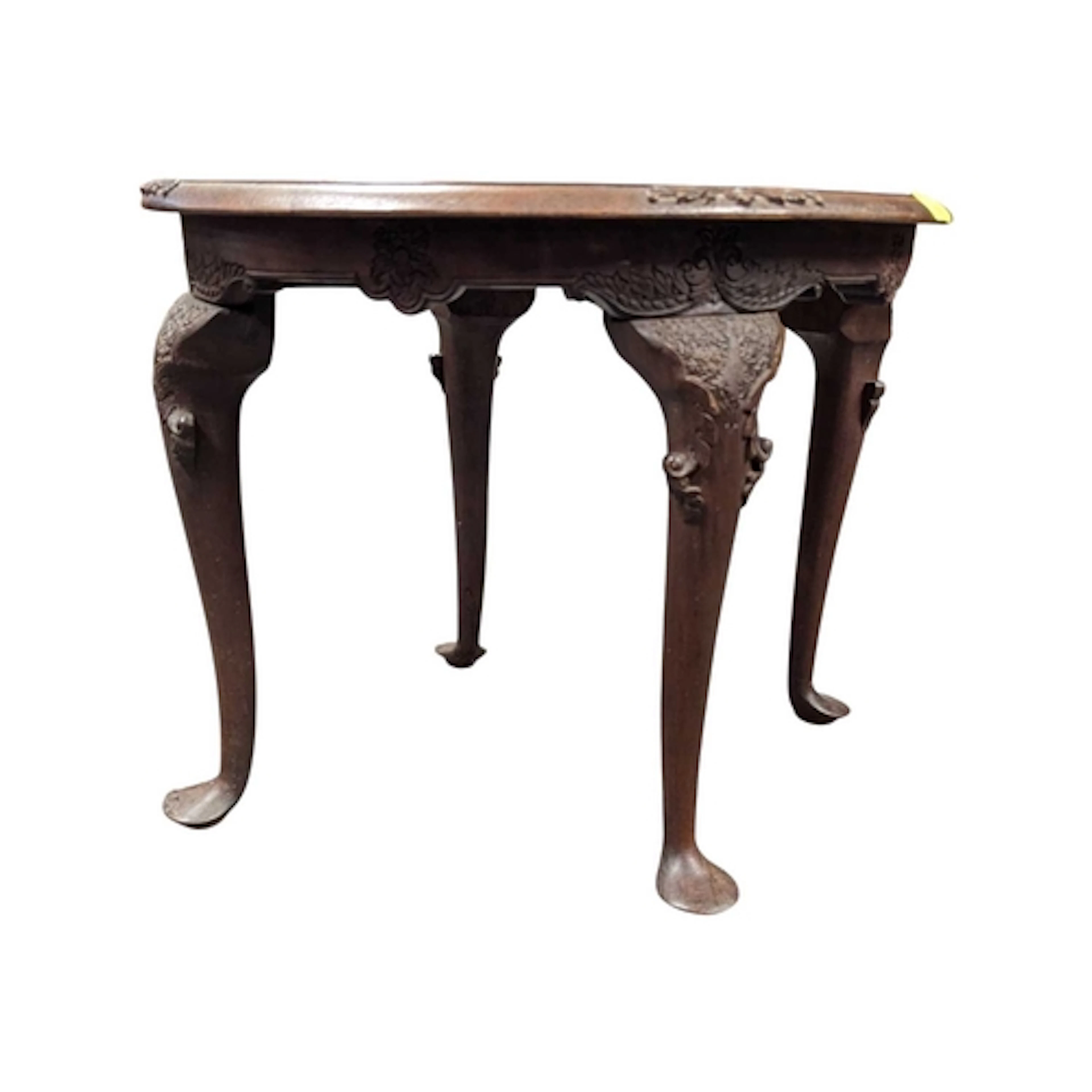 A 19th century Indian walnut carved occasional table. Oval f...