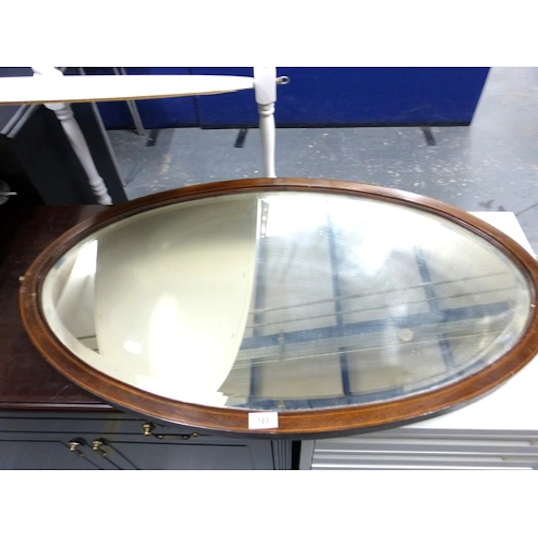 Vintage oval wall mirror.