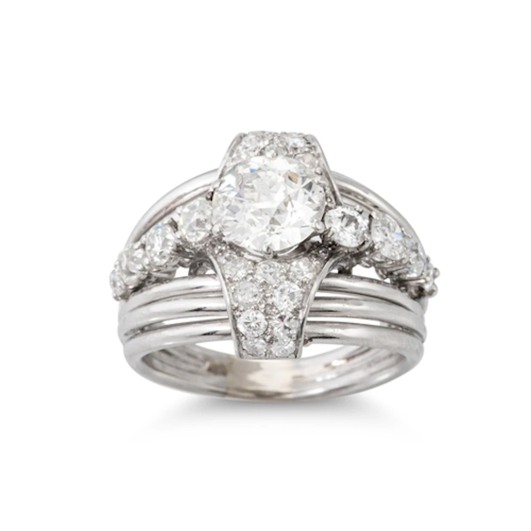 A VINTAGE BOUCHERON COCKTAIL RING, c. 1940s, set with old cu...