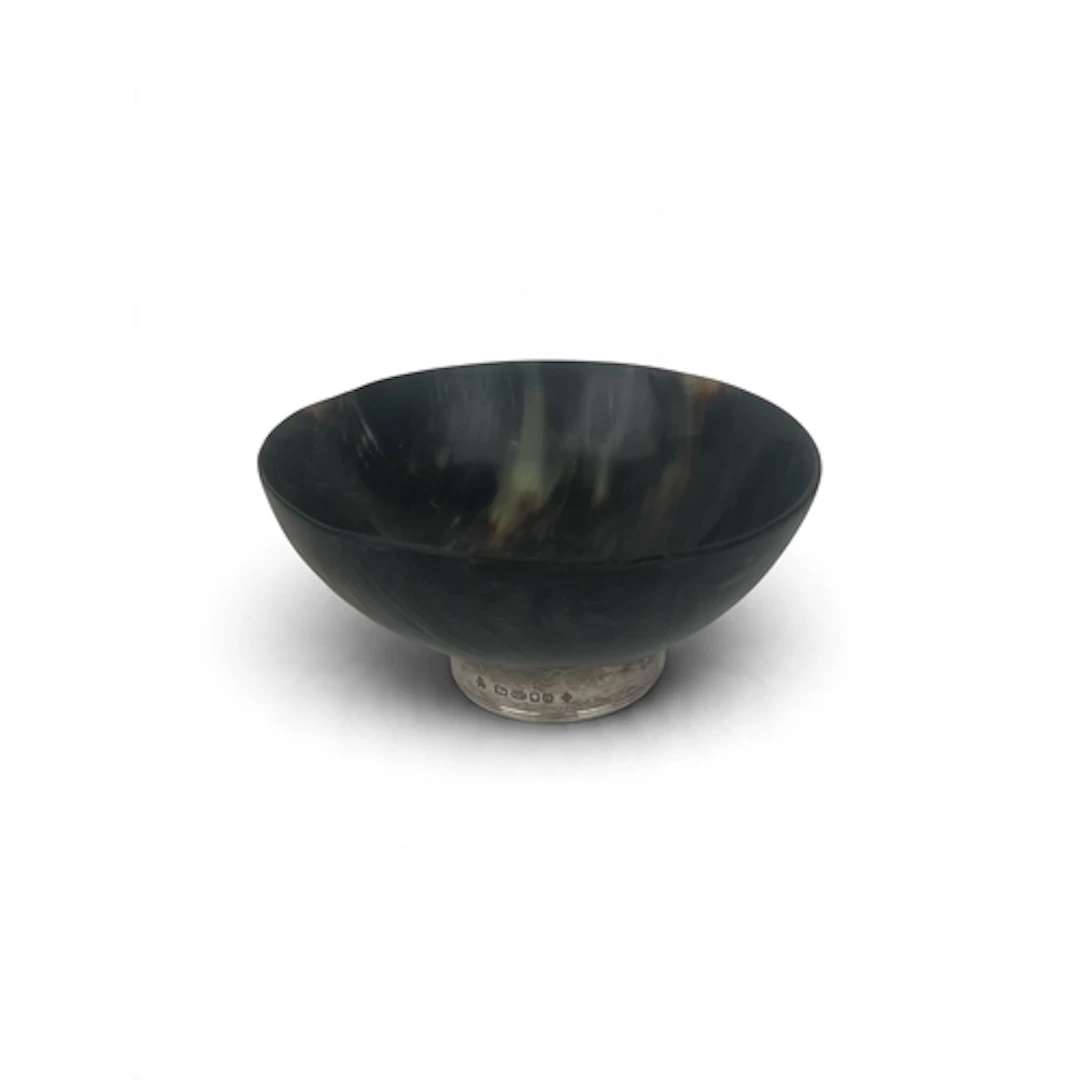 A SILVER MOUNTED ANIMAL HORN BOWL 16cm D