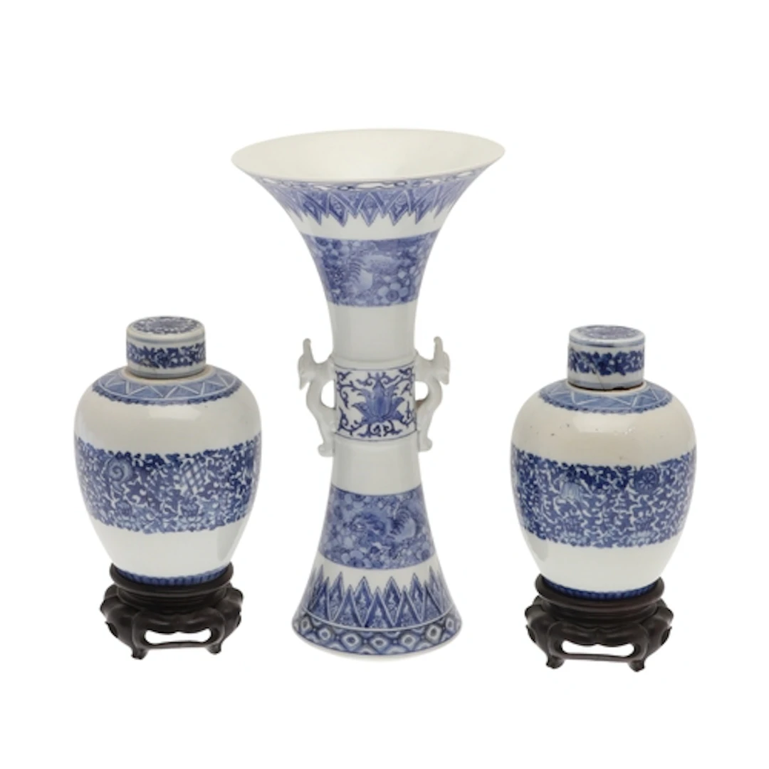 CHINESE GU TYPE VASE & PAIR OF LIDDED JARS. A Gu type porcel...