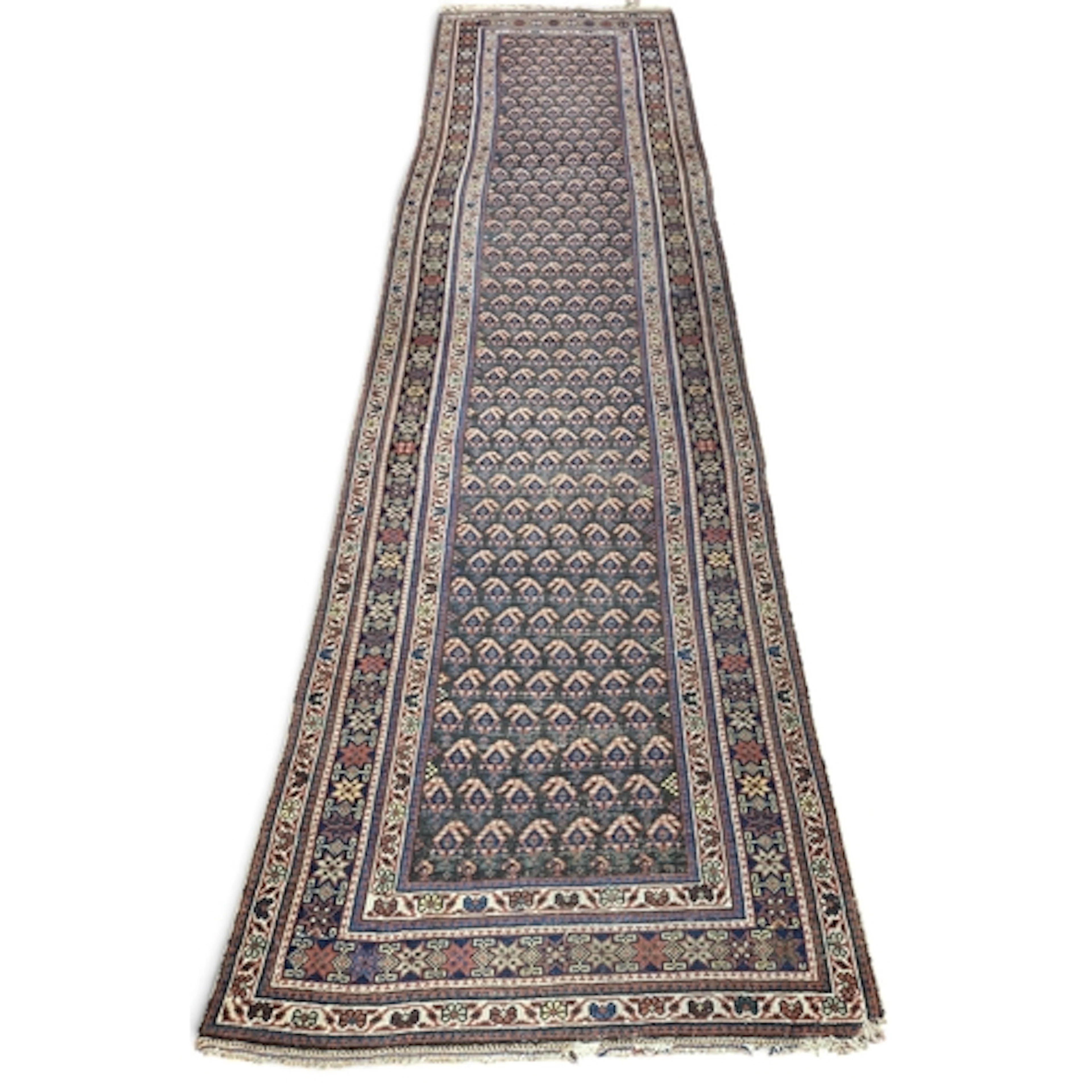 A good late 19th early 20th Century Persian Runner, red grou...