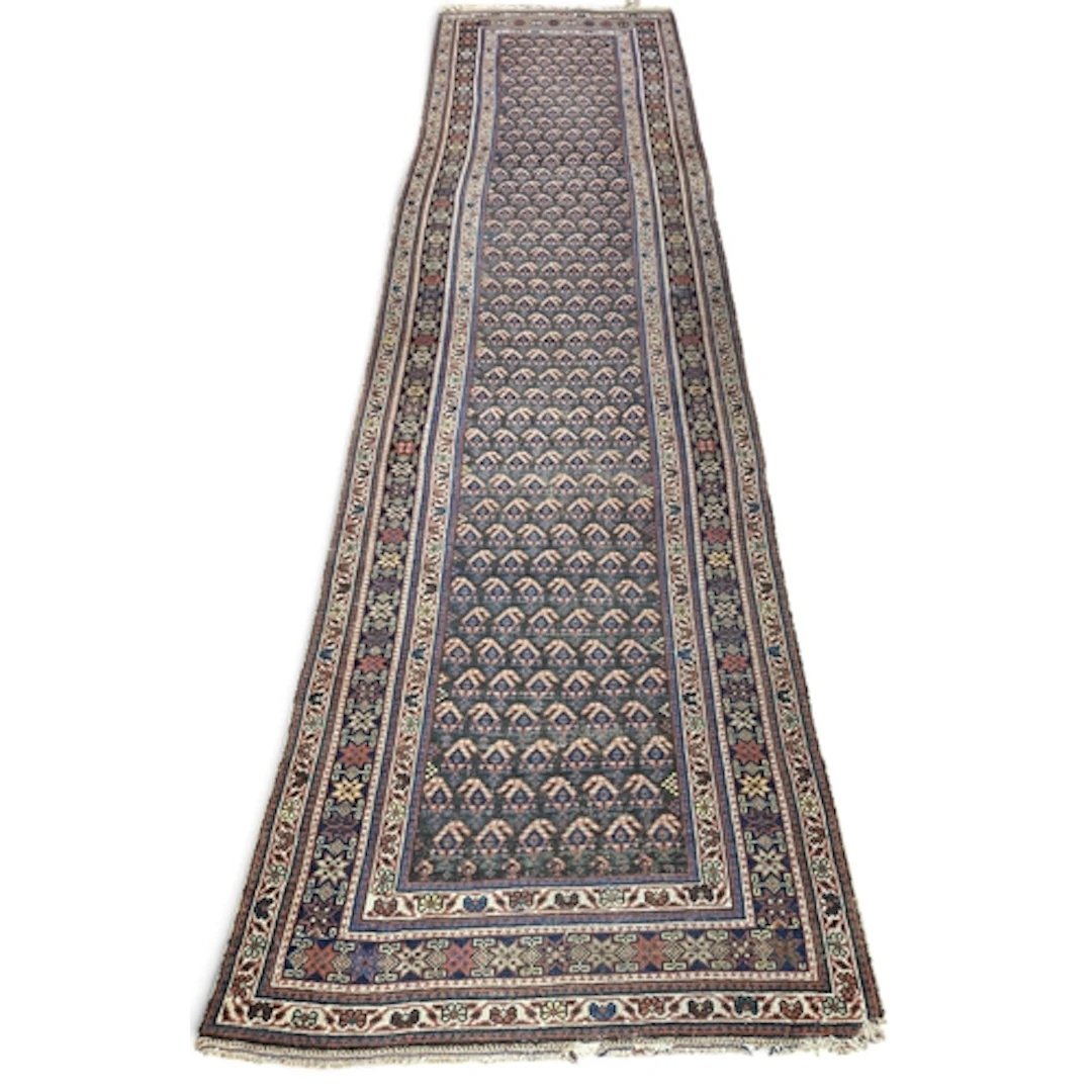 A good late 19th early 20th Century Persian Runner, red grou...