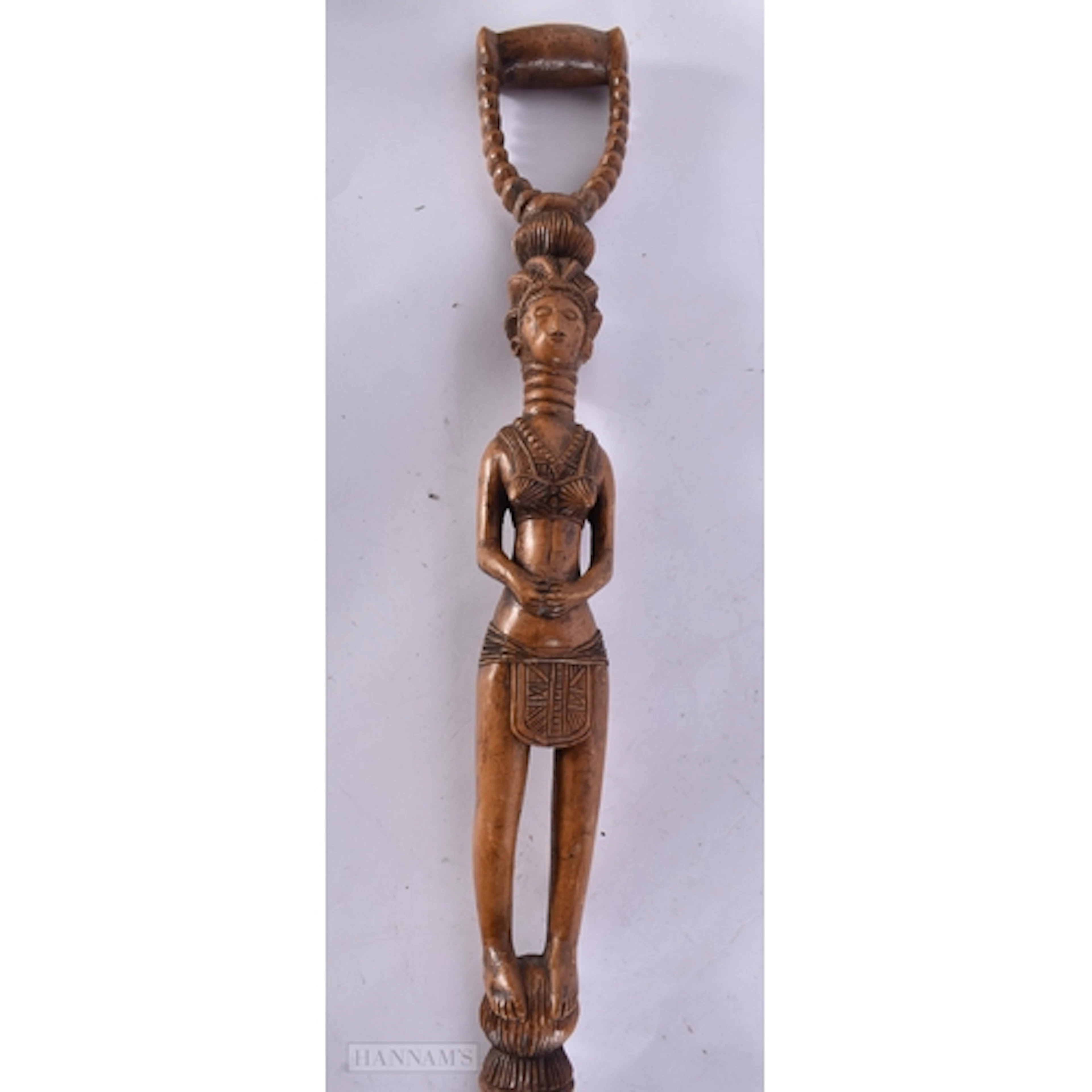 AN EARLY 20TH CENTURY AFRICAN CARVED WOOD FERTILITY STAFF fo...