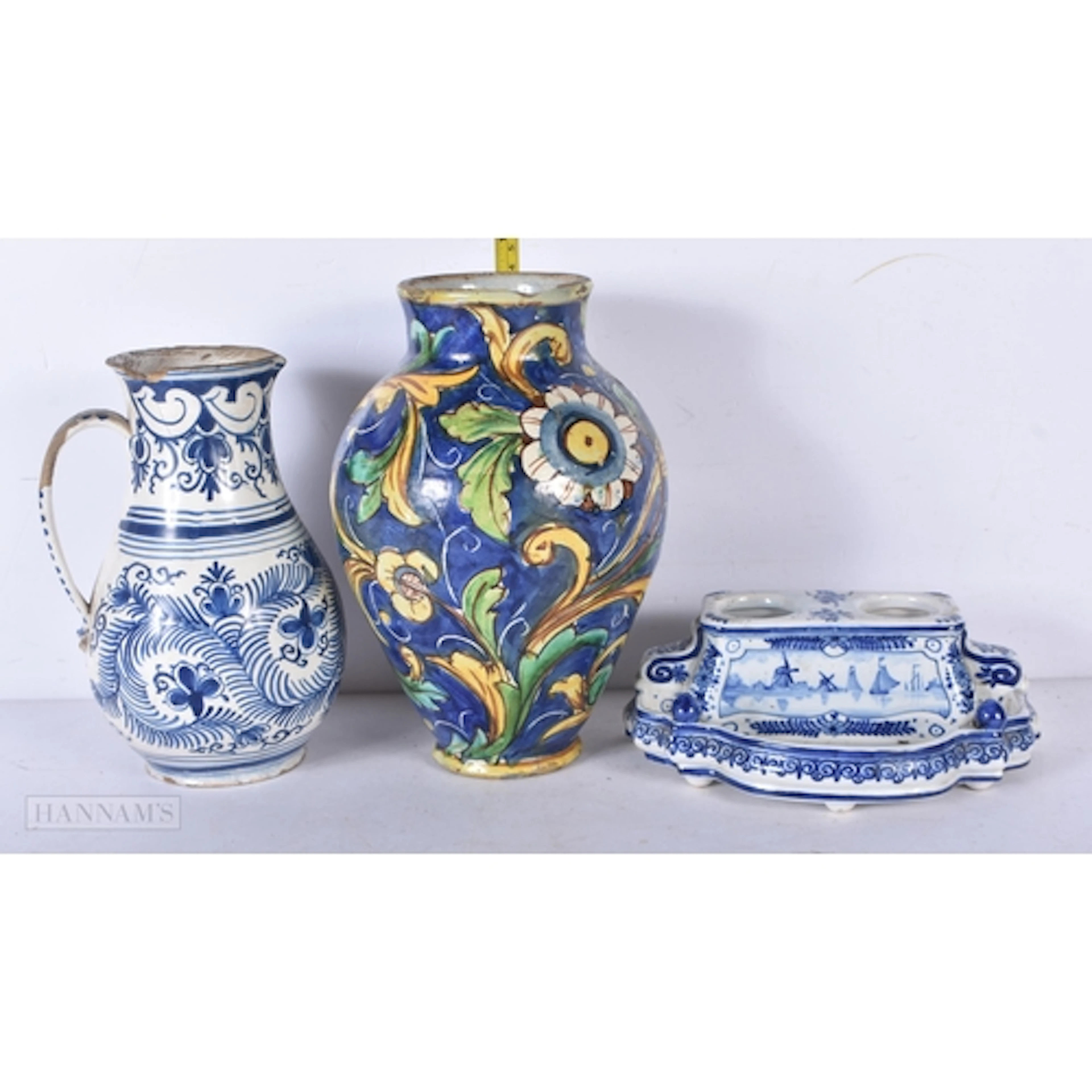 An antique Delft tin glazed ink stand together with two glaz...