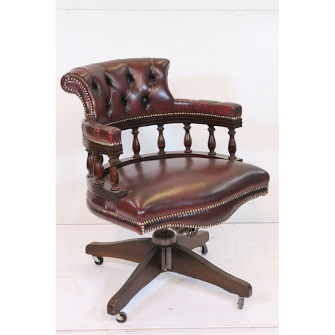 20th century button back captain's swivel armchair, having t...
