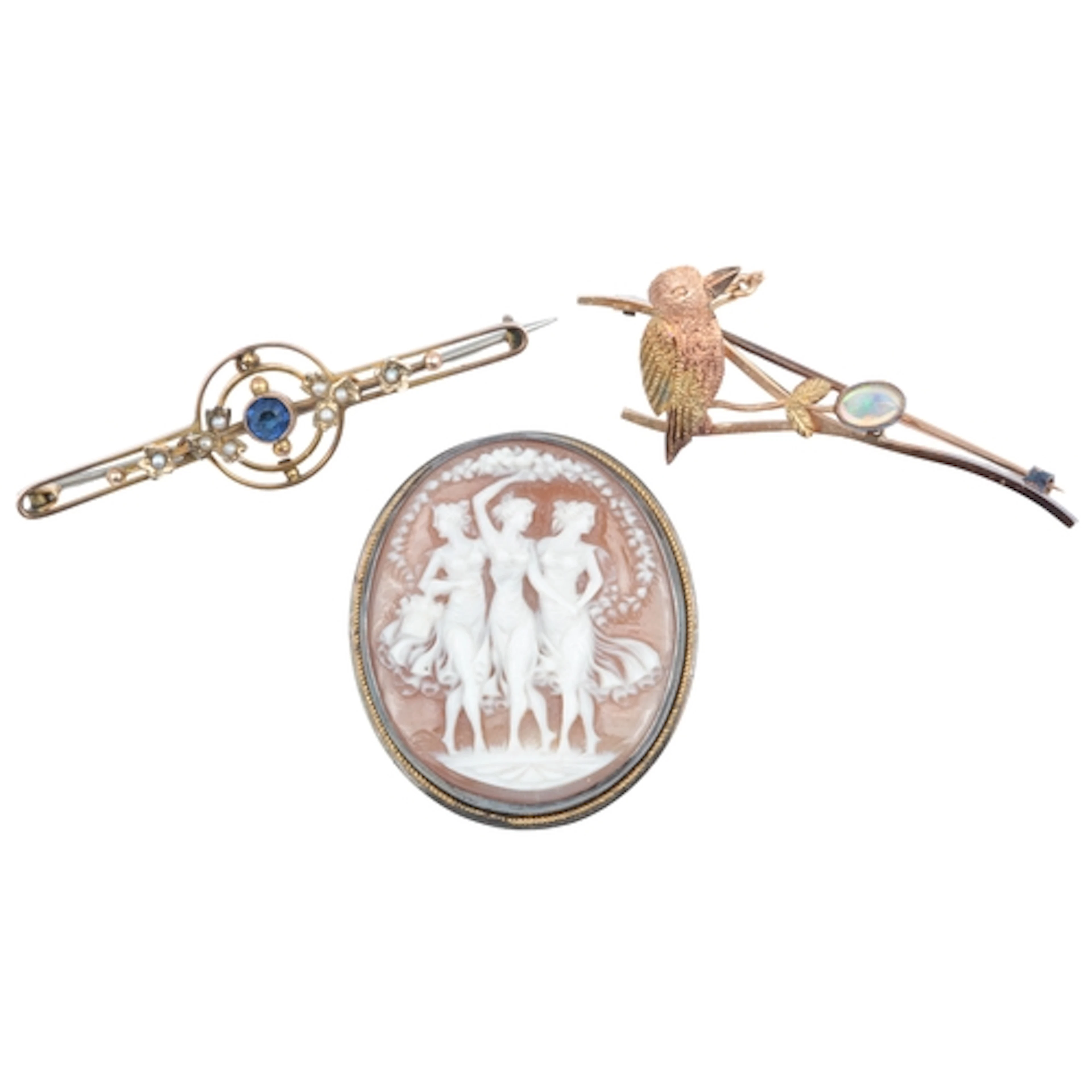 Three brooches, comprising: a gold and opal brooch designed ...