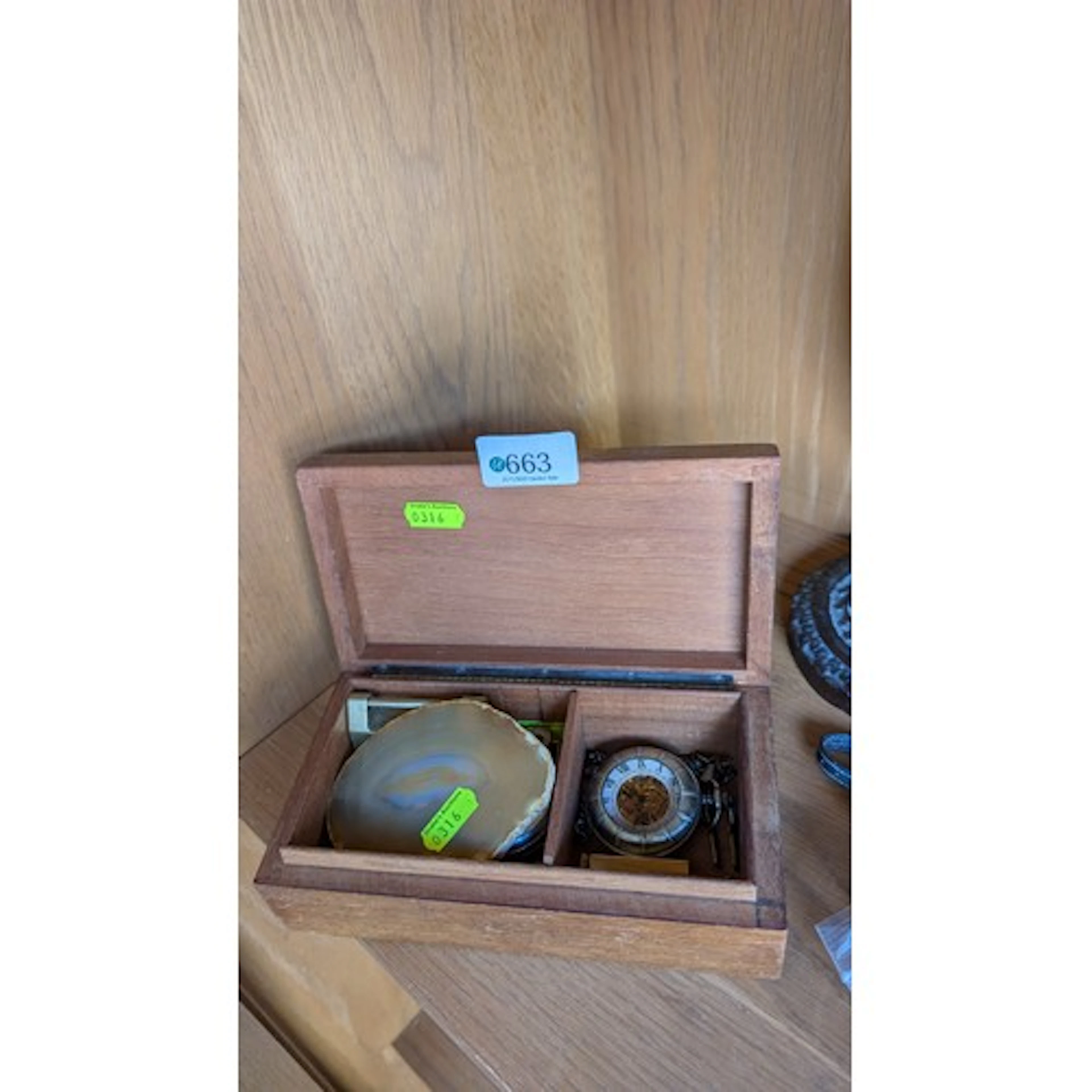 Wooden cigarette box containing mini brass abacus, stop watc...