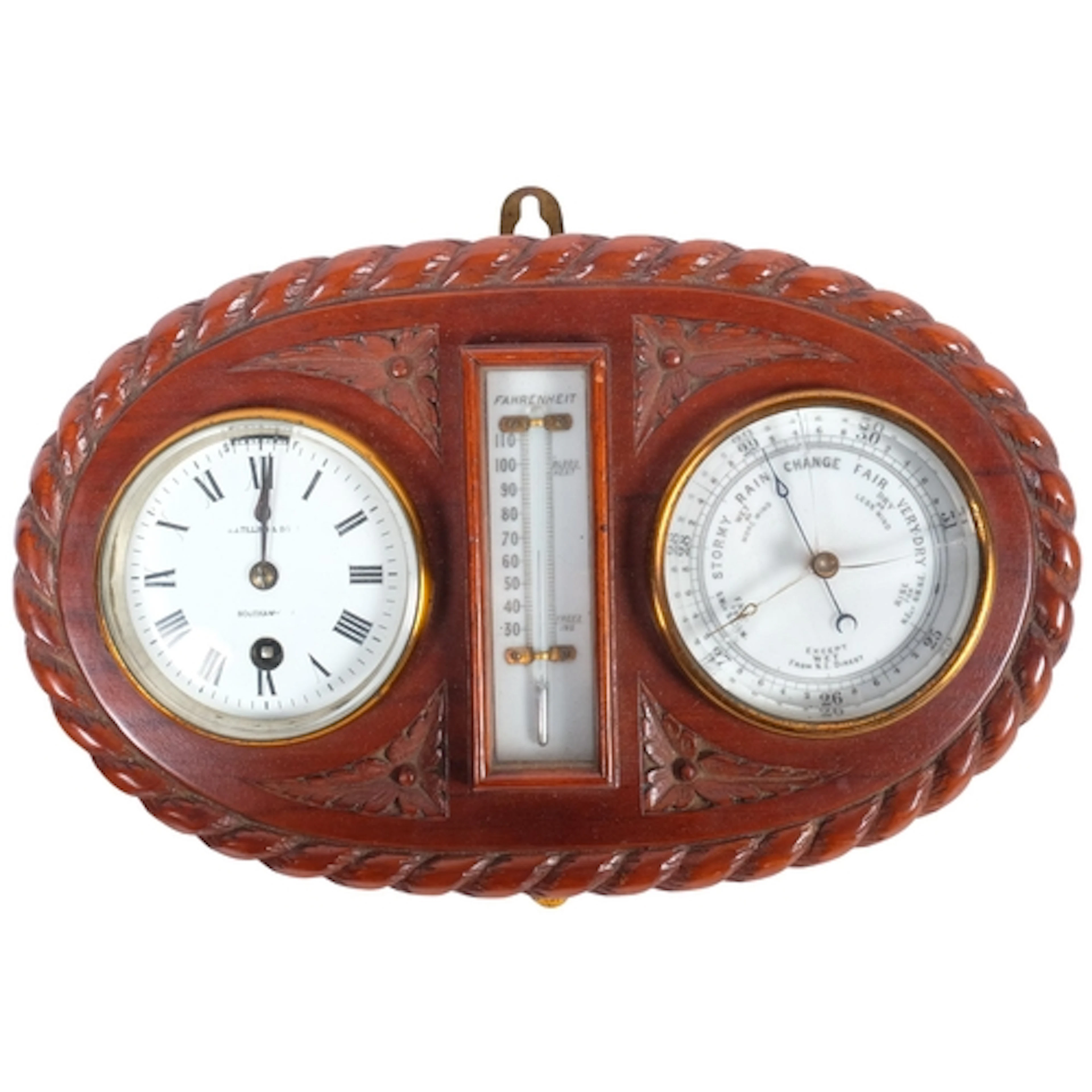 An Antique clock, barometer and thermometer, on carved wood ...