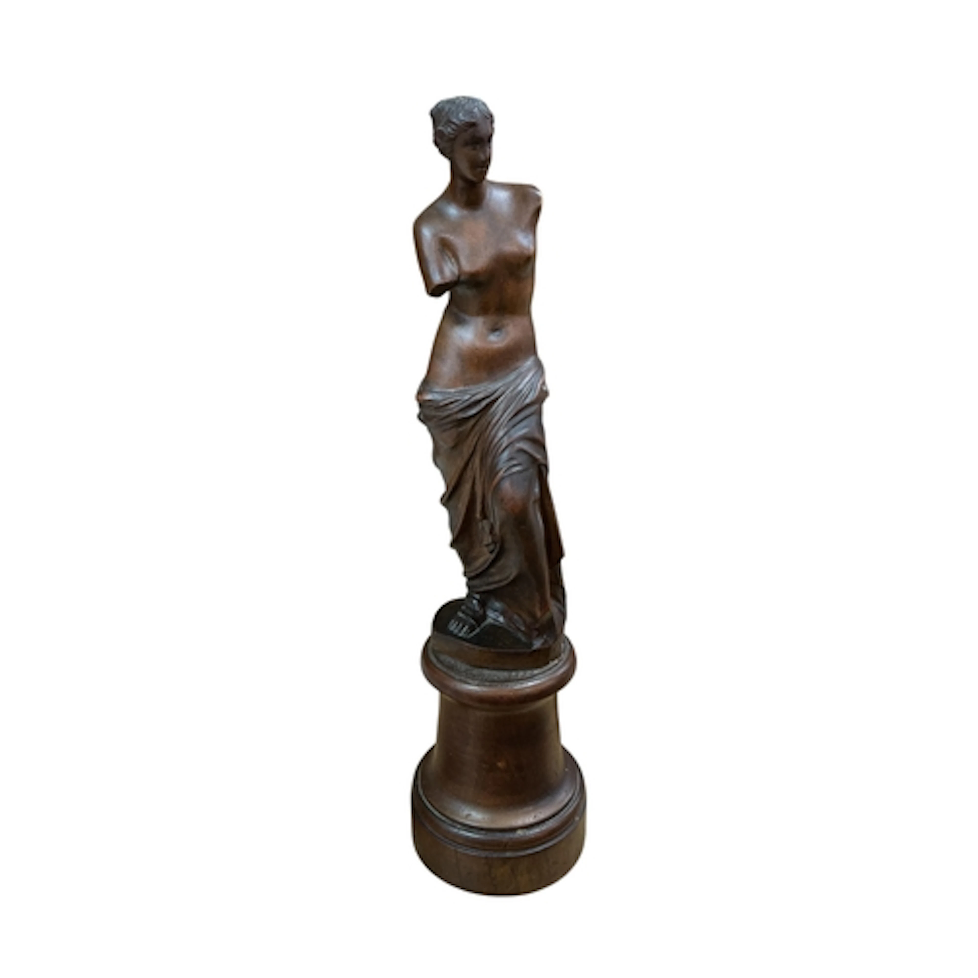 A early 20th century carved walnut figure of the Venus de Mi...