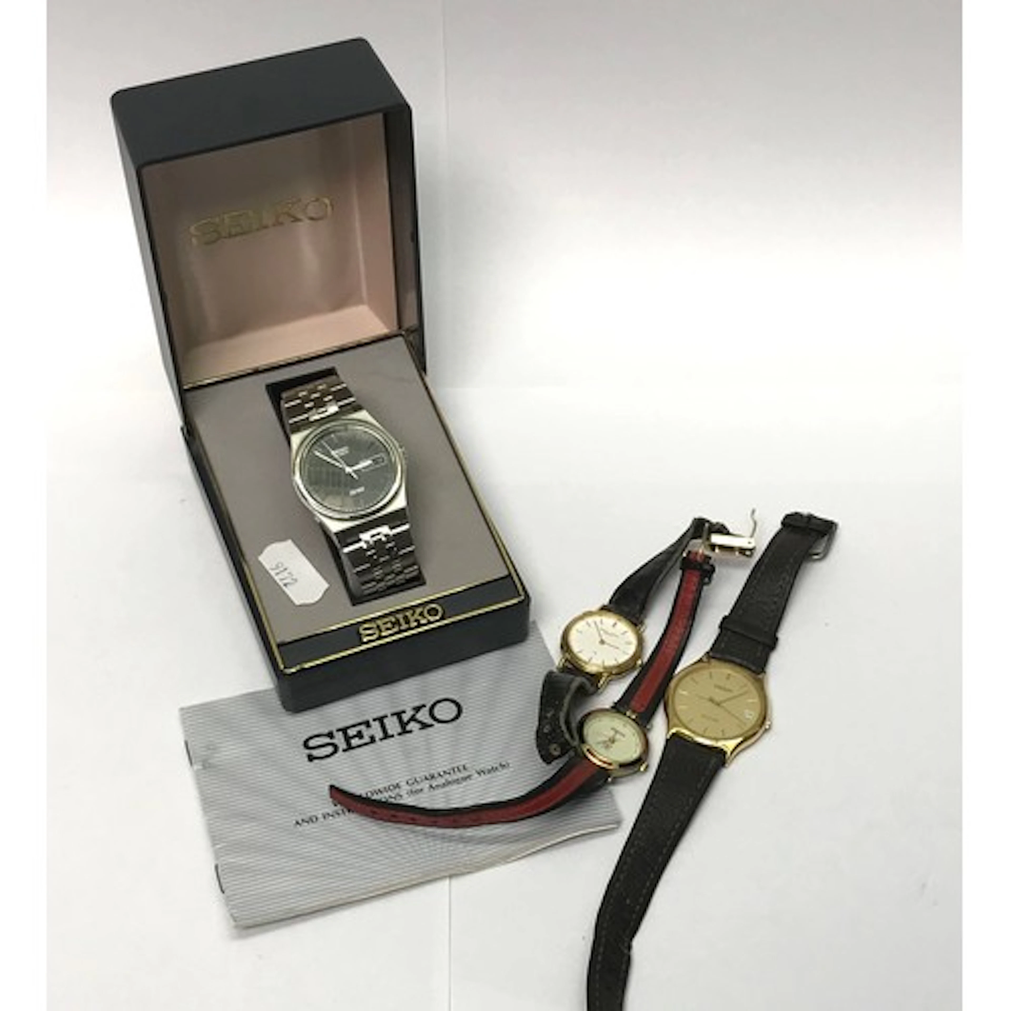 A Seiko Quartz SQ100 black dialled steel bracelet watch c198...