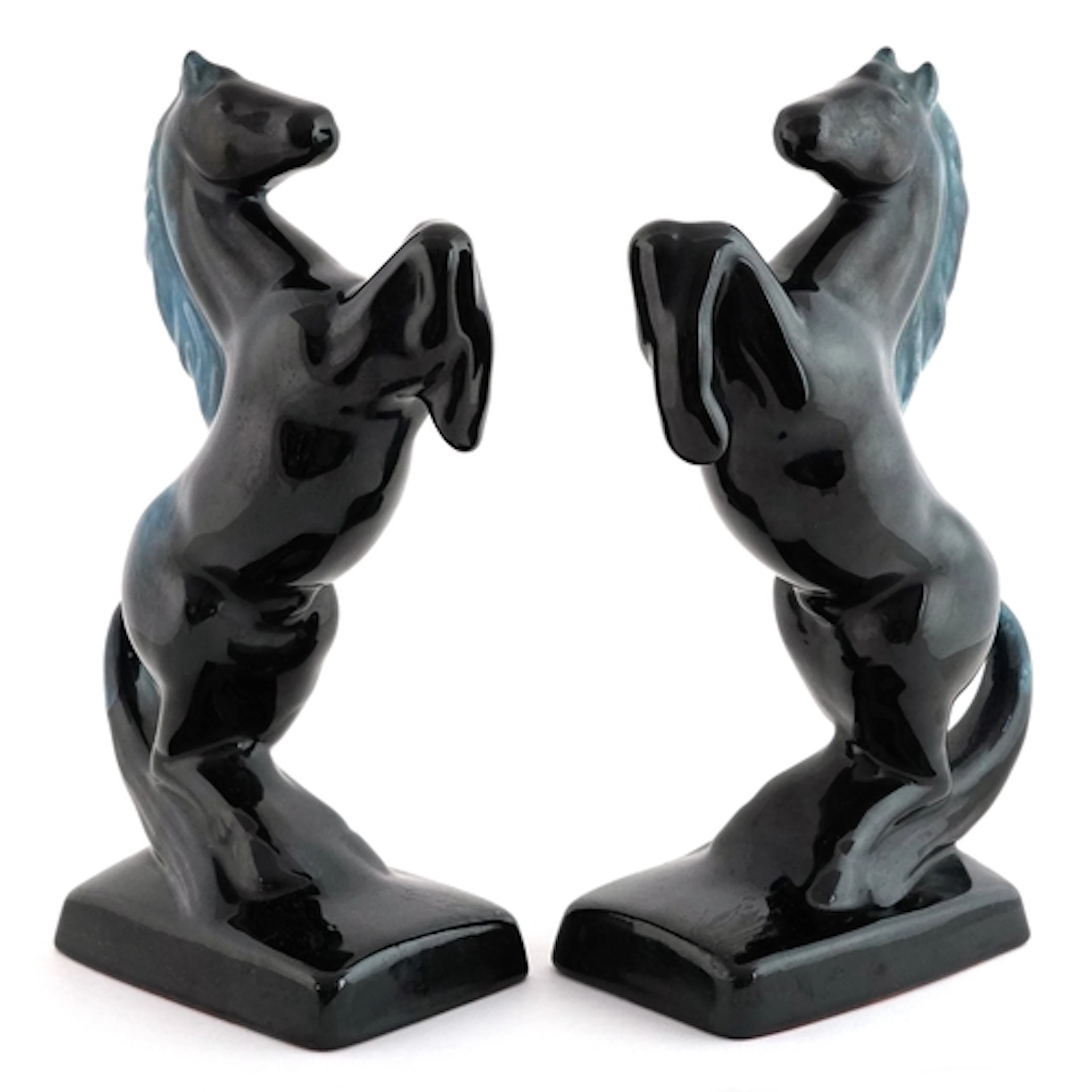 Pair of Blue Mountain pottery studies of rearing horses, 23c...