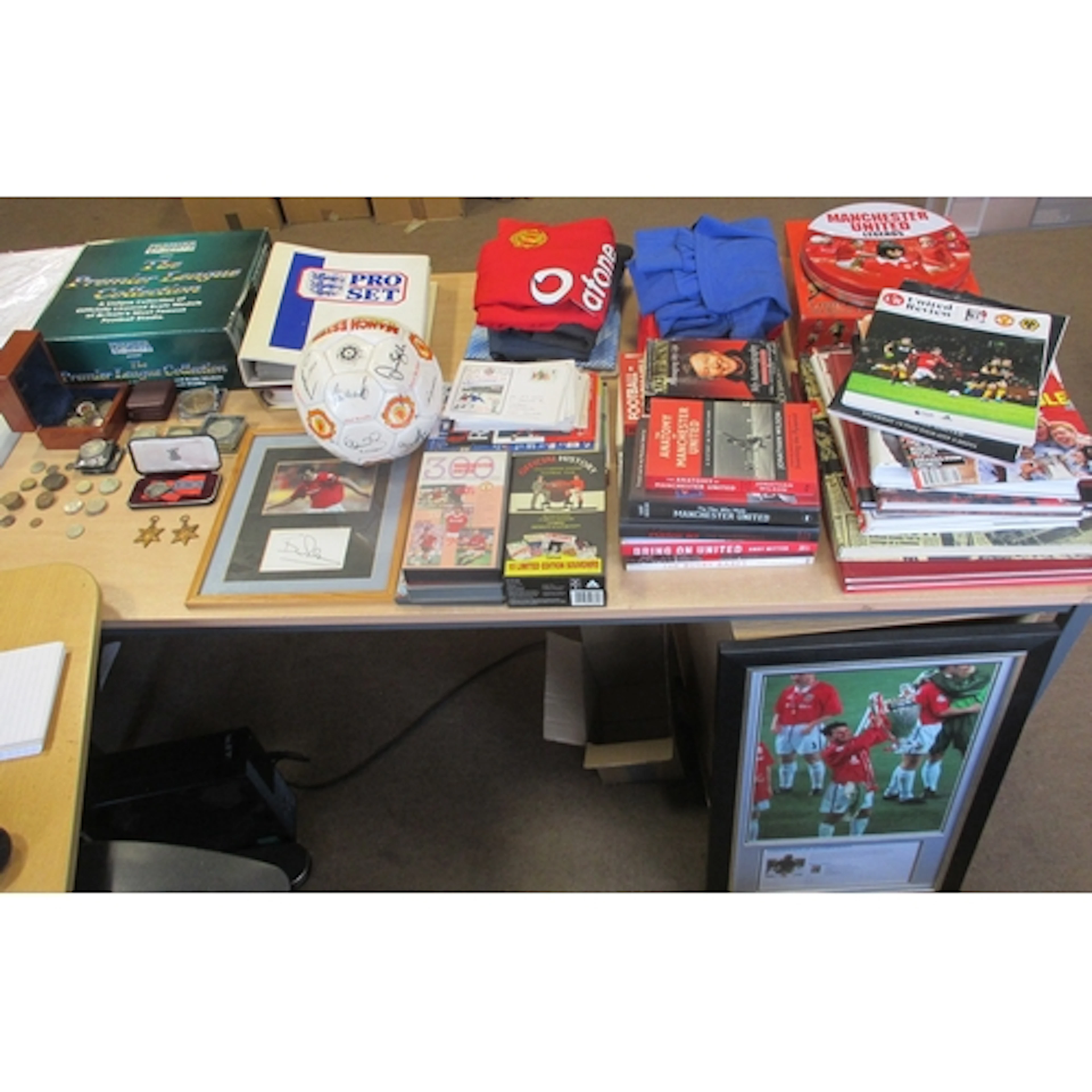 Collection of Manchester United collectables and related med...