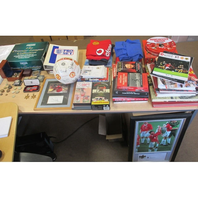 Collection of Manchester United collectables and related med...