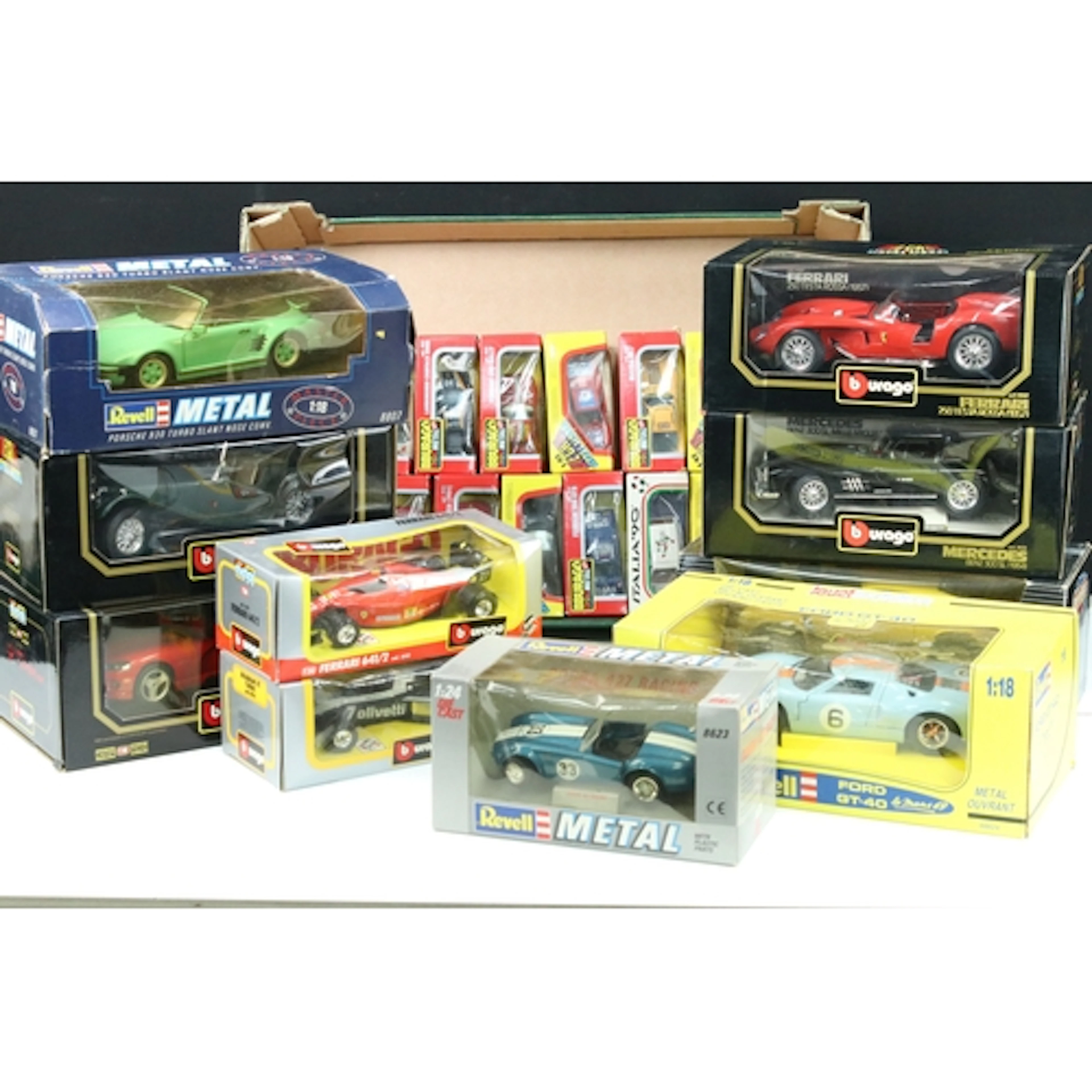 26 Boxed 1/43 - 1/18 diecast models to include 22 x Bburago,...
