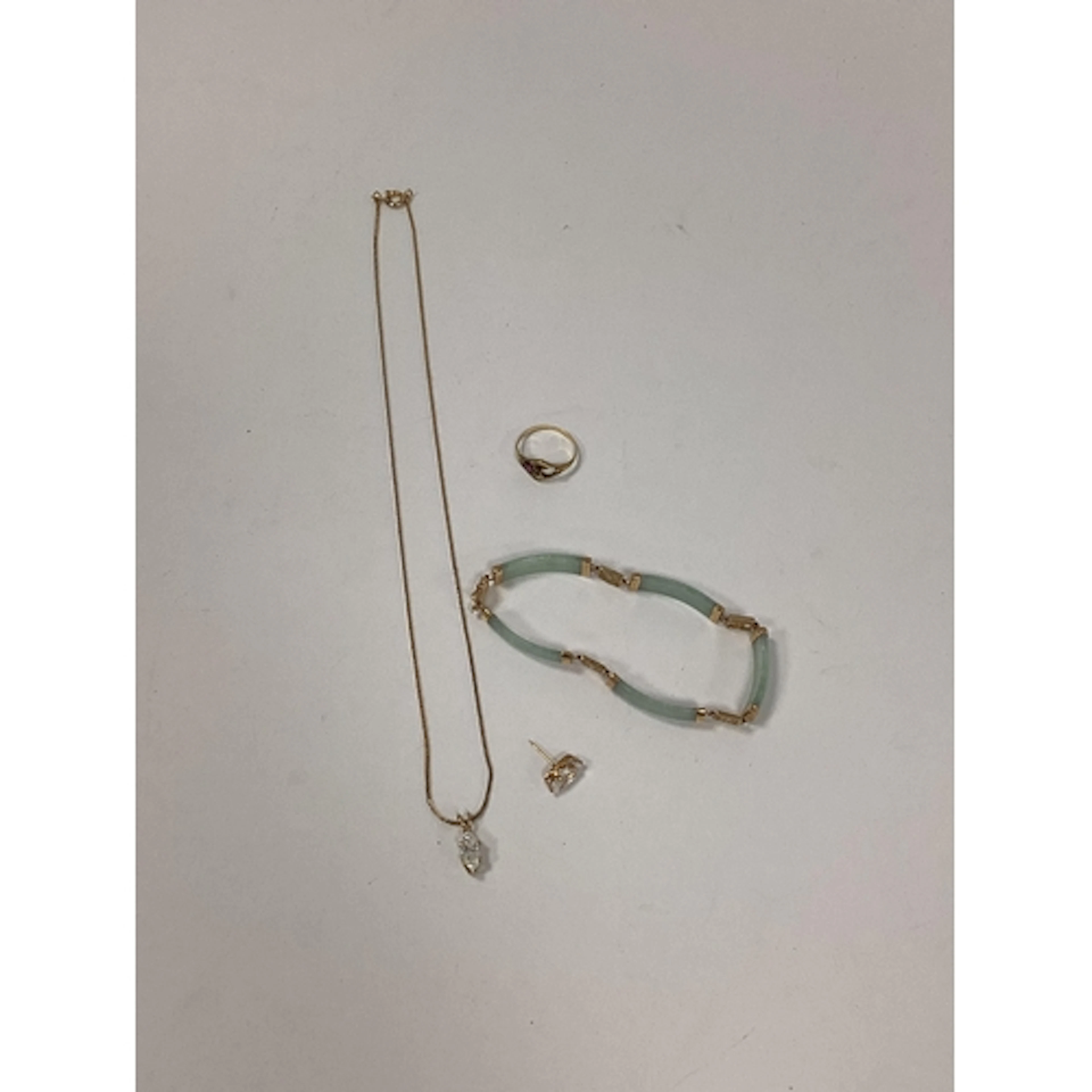A Modern Chinese Jade Bracelet, with character mark spacers,...