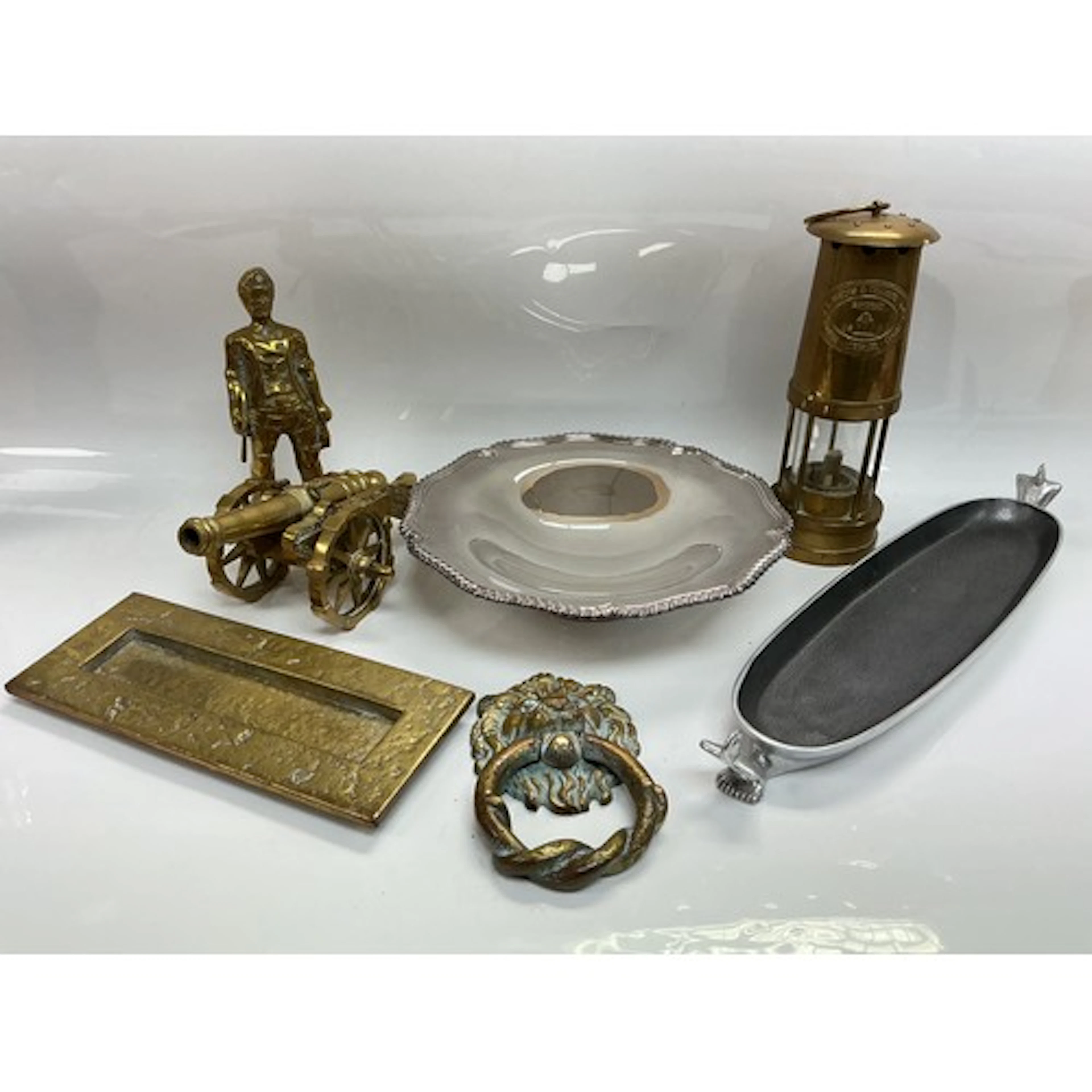 A collection of metalware comprising a Carrol Boyes dish, a ...