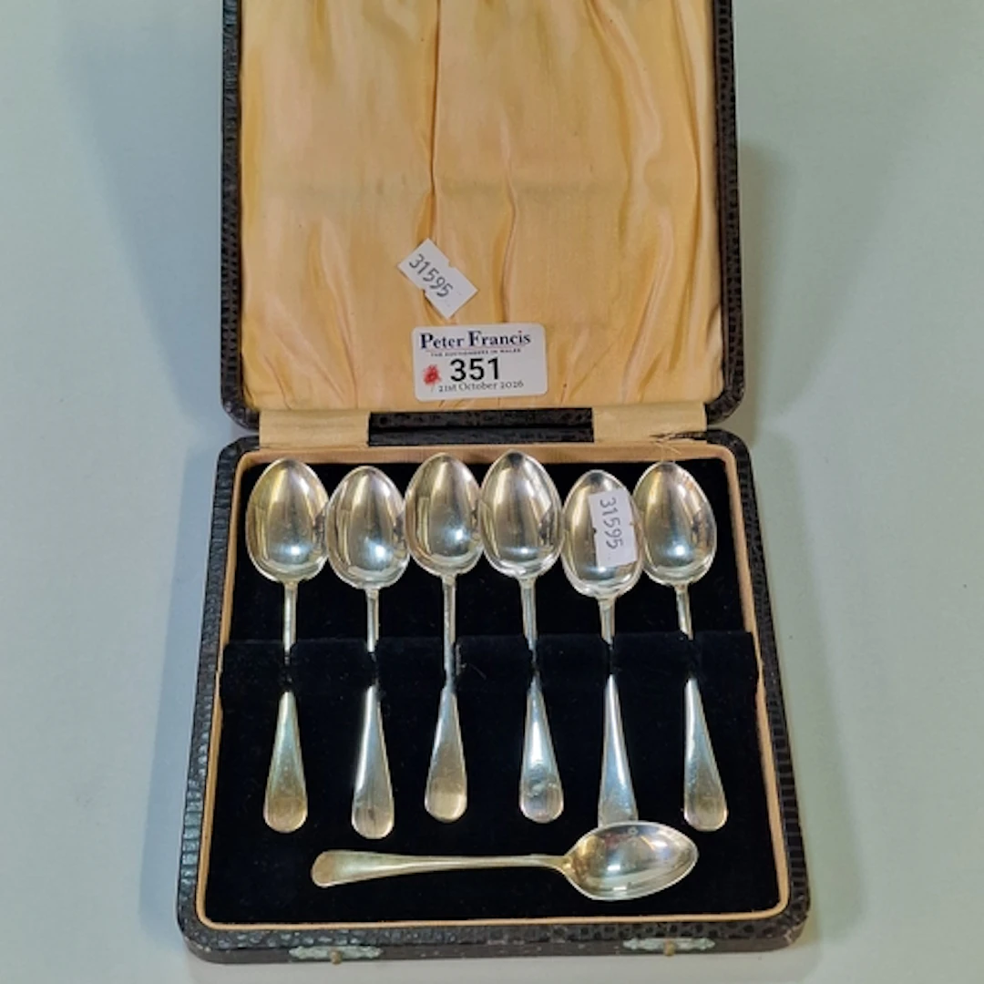 Set of six silver cased teaspoons, together with another. (7...