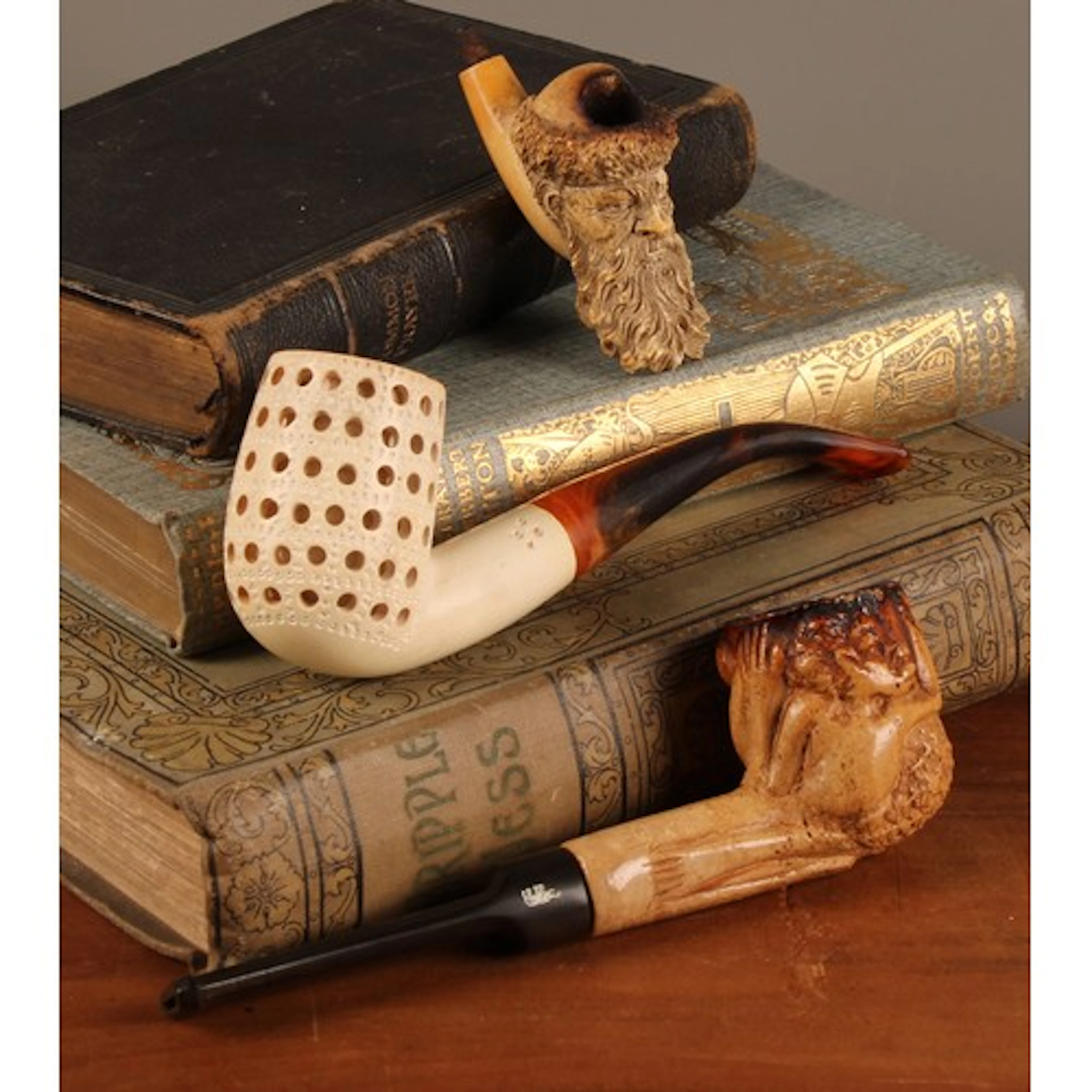 A 19th century Meerschaum pipe, the bowl carved with the hea...