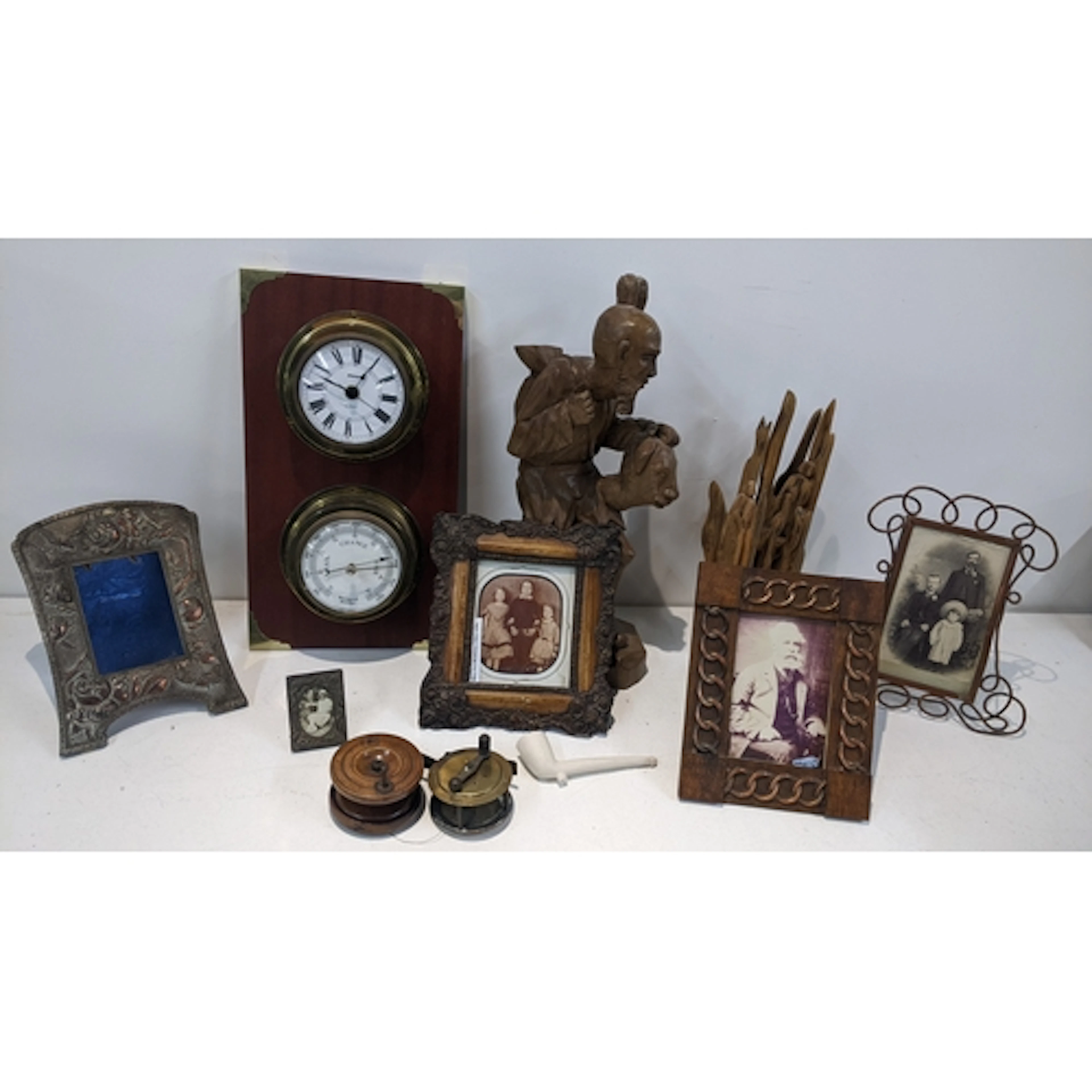 A mixed lot to include an Art Nouveau photograph frame, fish...