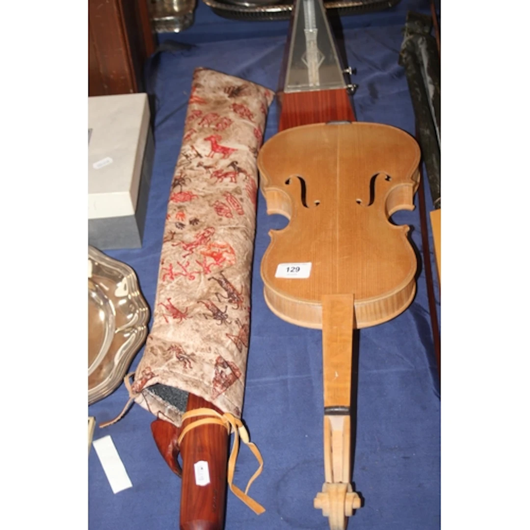 Violin, bow, metronome, wooden flute