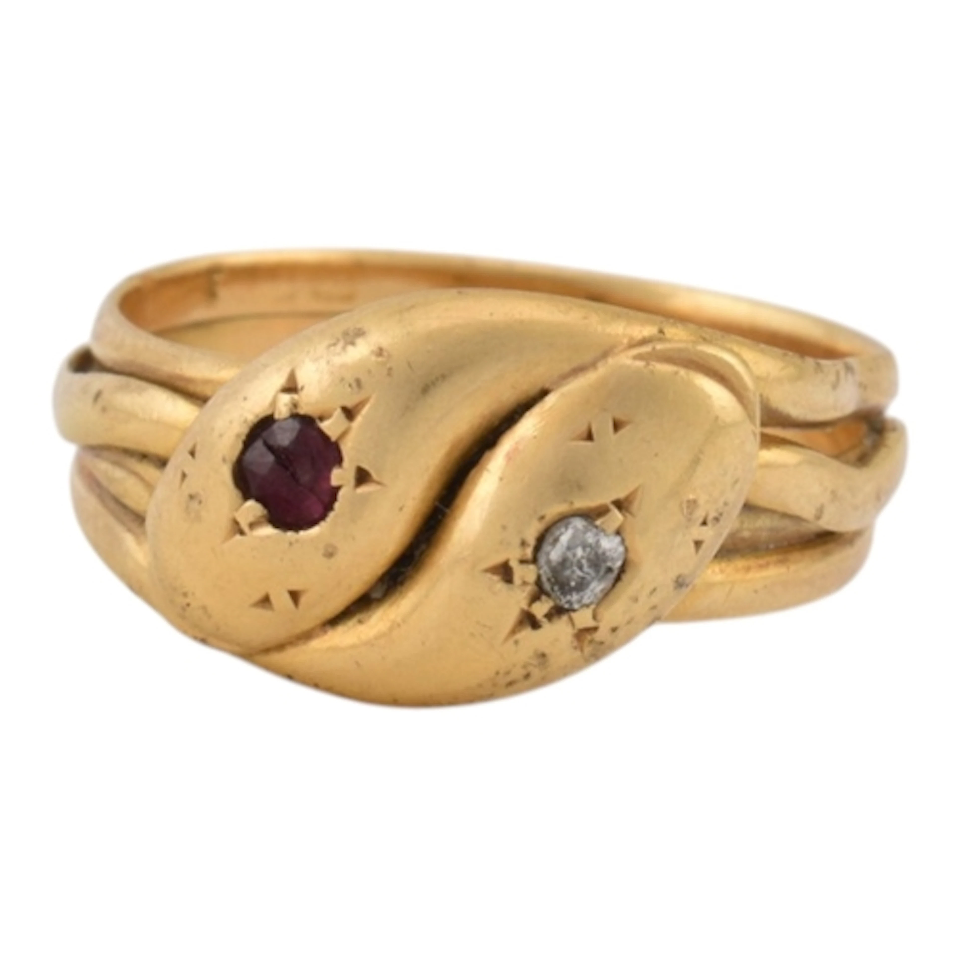 A 19th century Victorian, gold, ruby and diamond snake ring....
