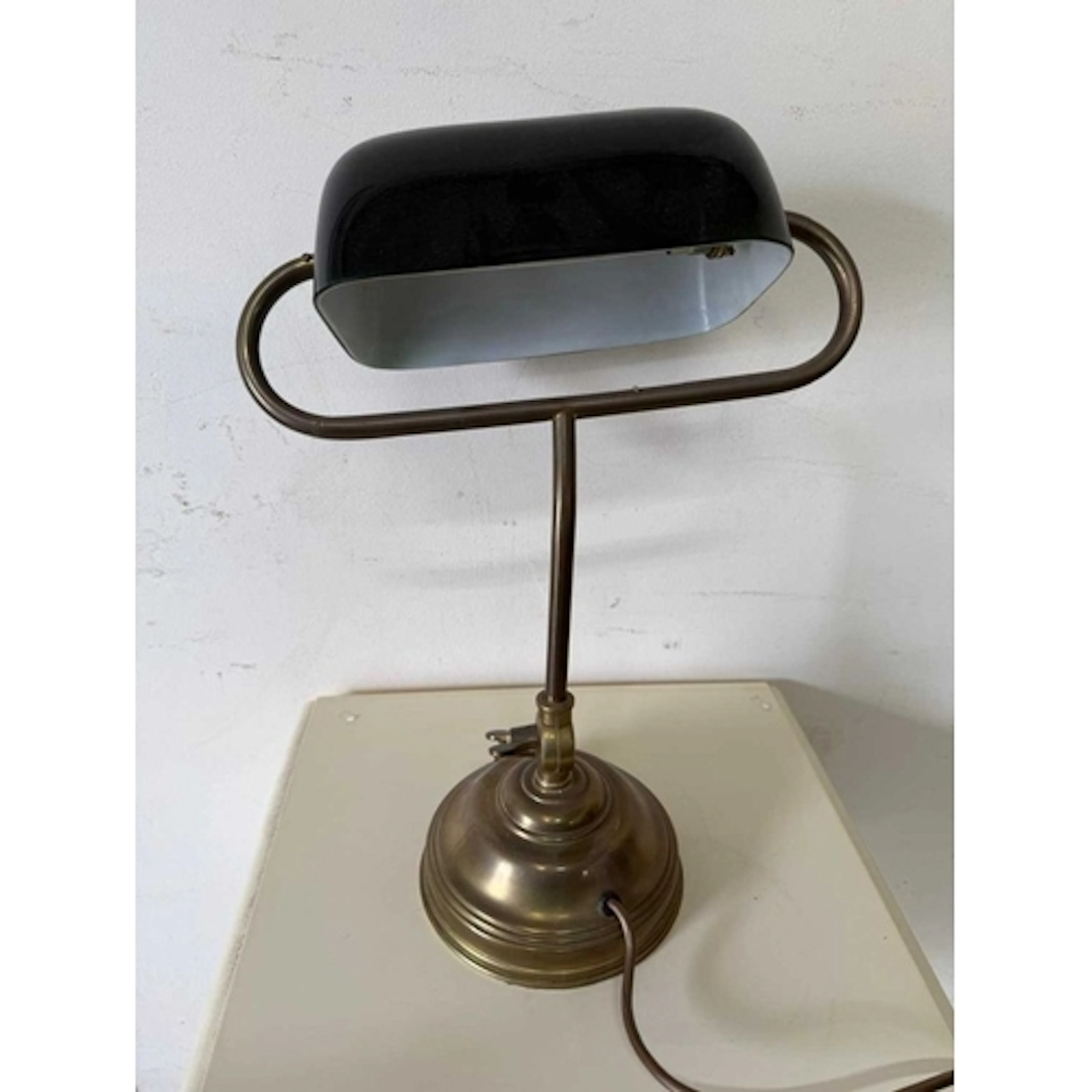 Brass banker lamp with dark green glass shade