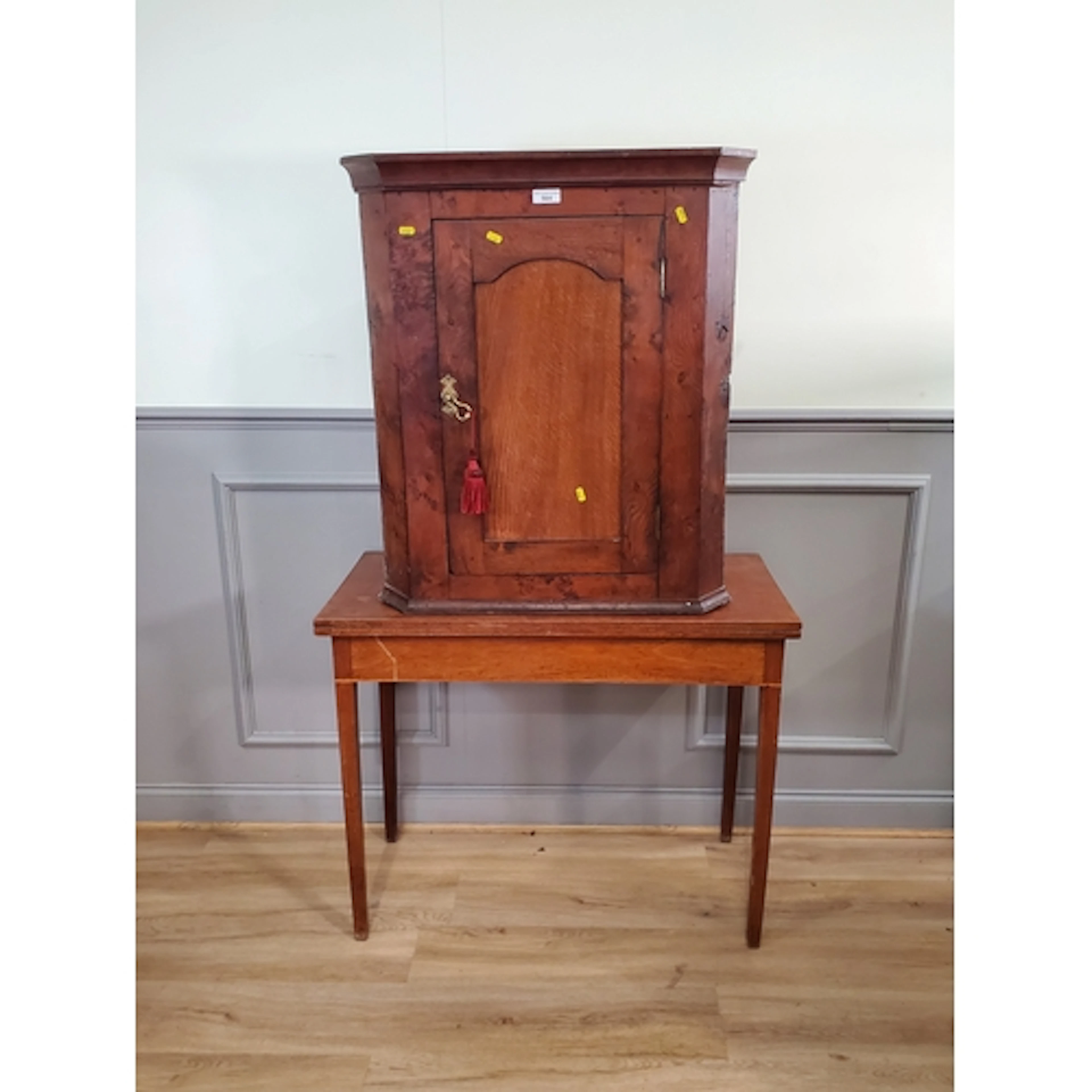 An oak corner Cupboard and an oak fold over Table, (R3).