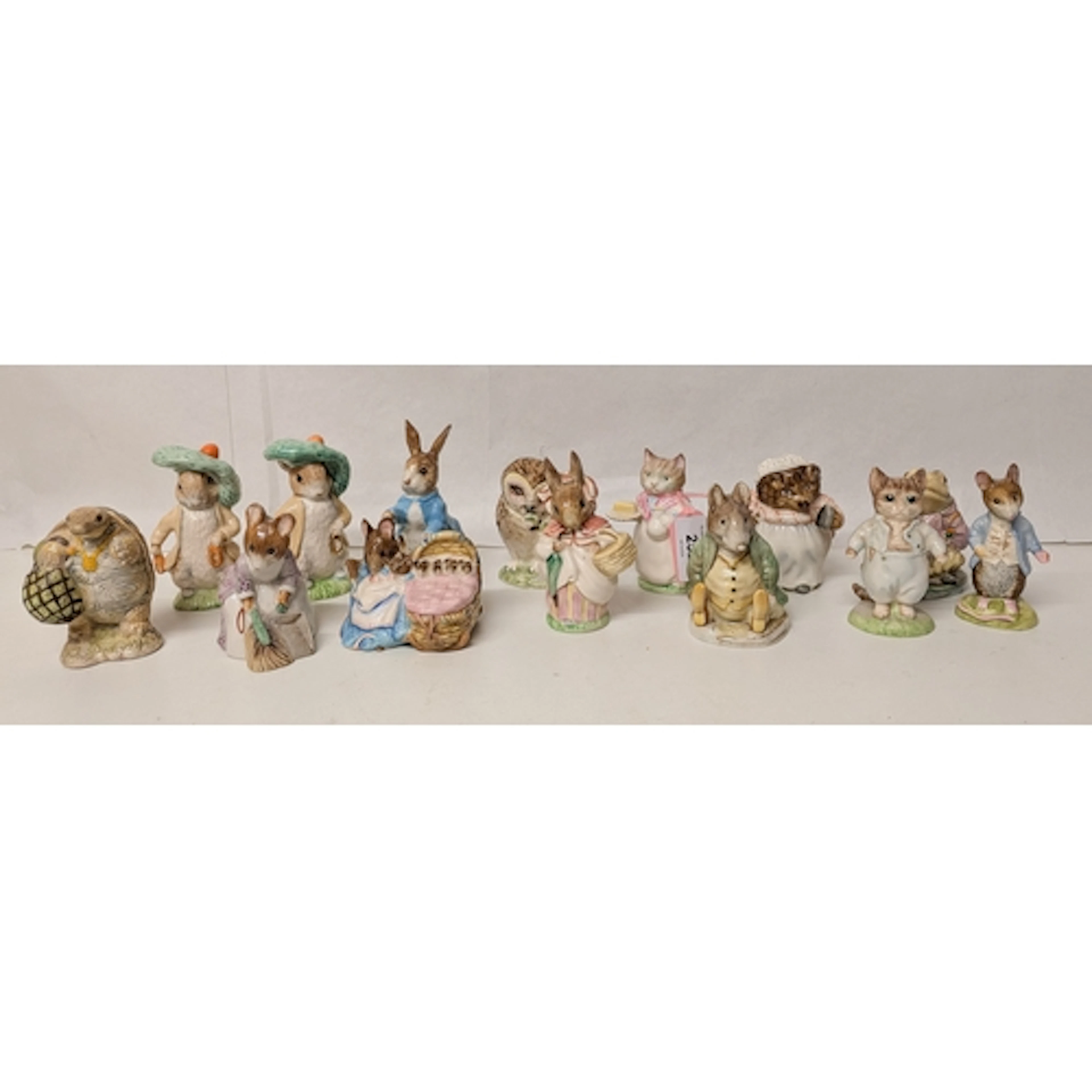 A collection of Beswick Beatrix Potter animal figurines (fou...
