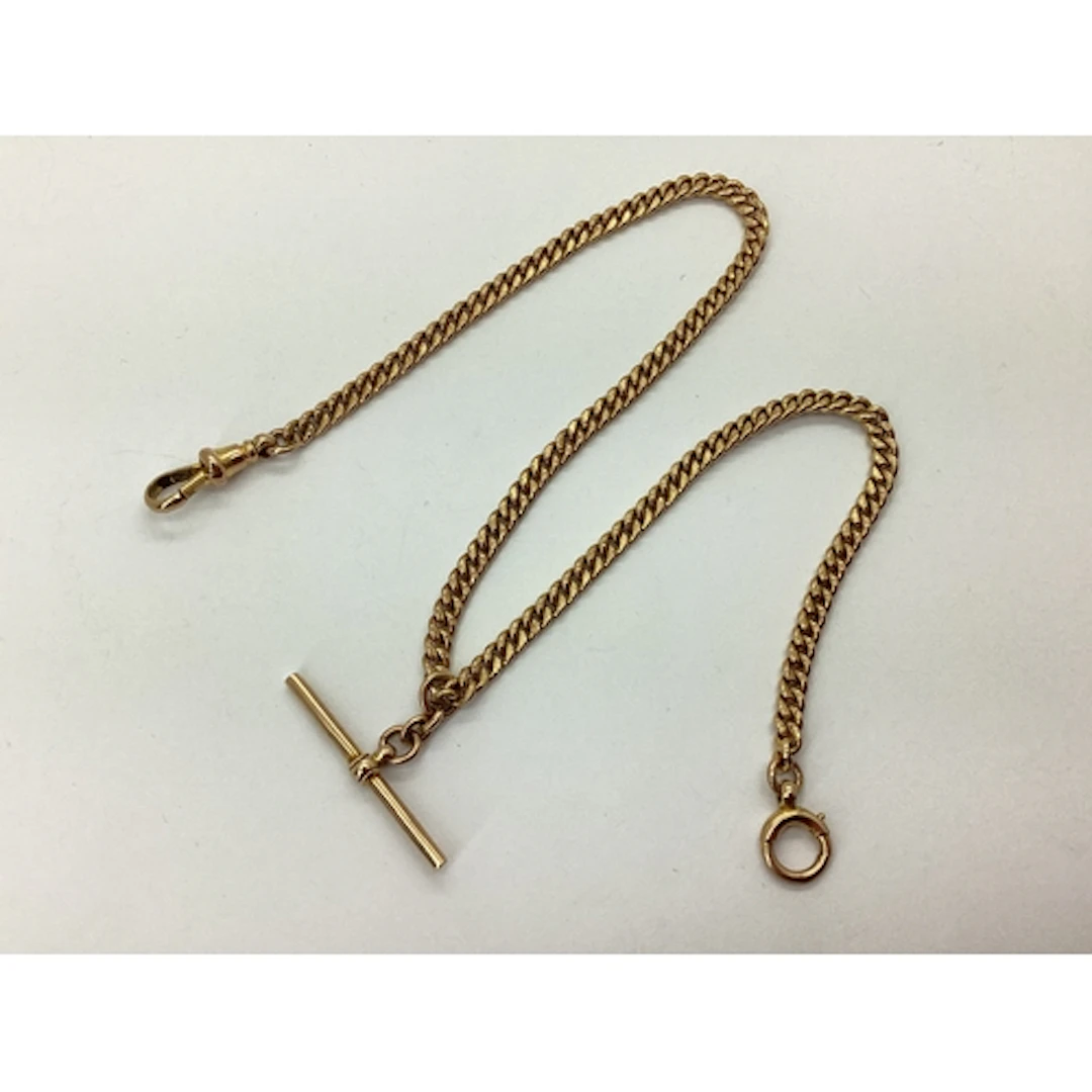 A 9ct Gold Curb Link Albert Chain, (links stamped) to single...