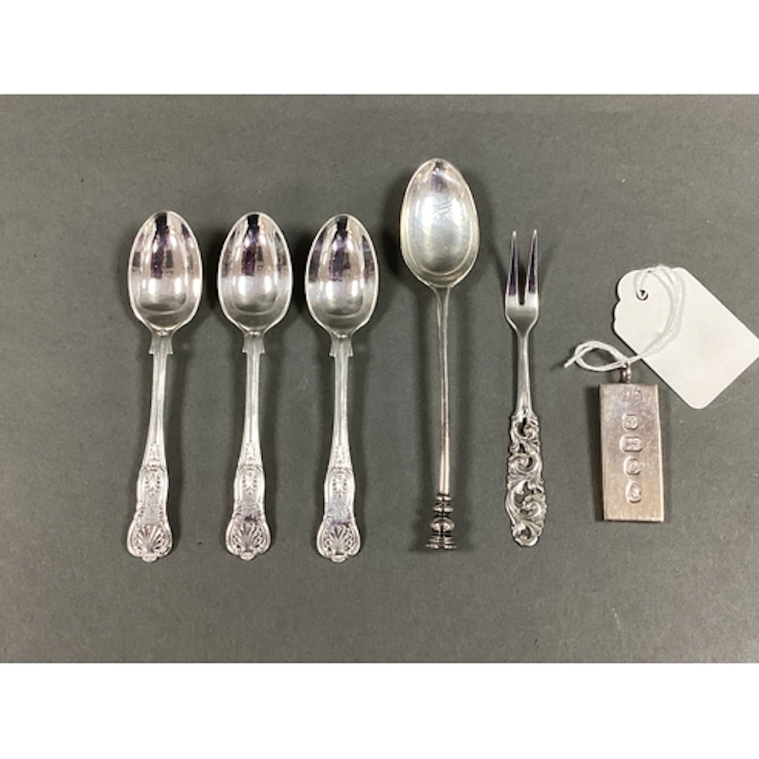 A Set of Three Hallmarked Silver Coffee Spoons, a hallmarked...