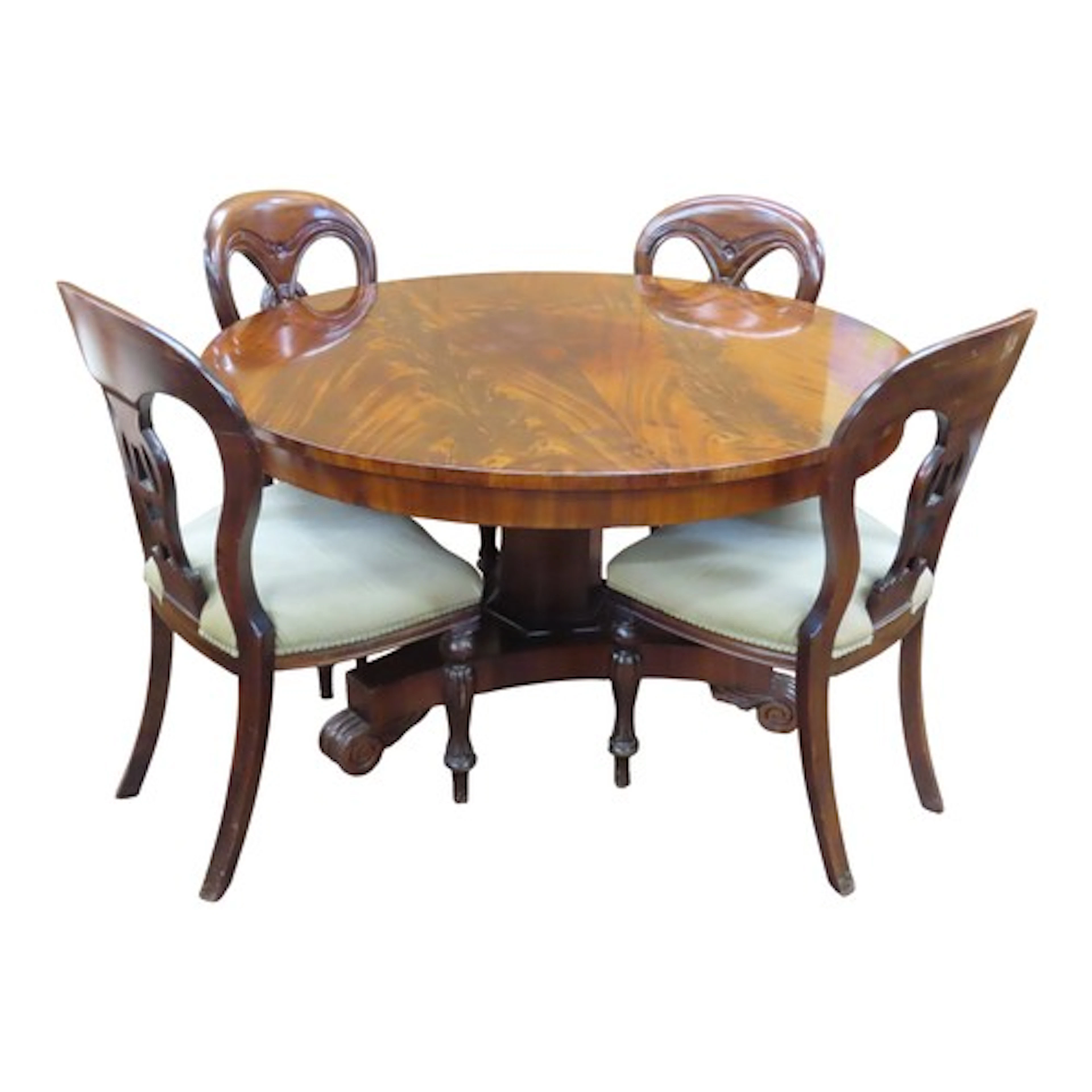 An early Victorian 19th c mahogany tea table with a circular...