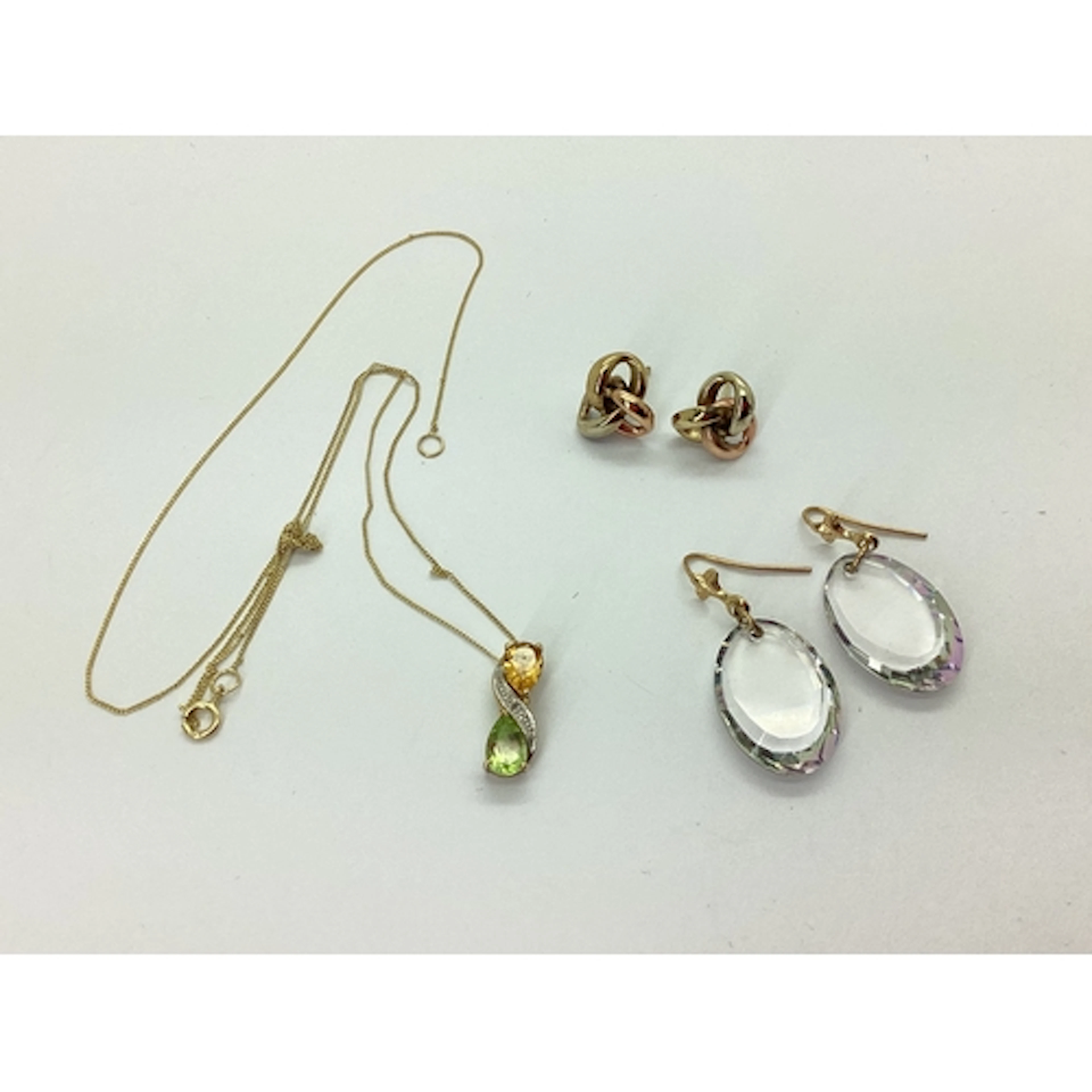 A Modern Dainty Two Stone Pendant, stamped "375", on a fine ...