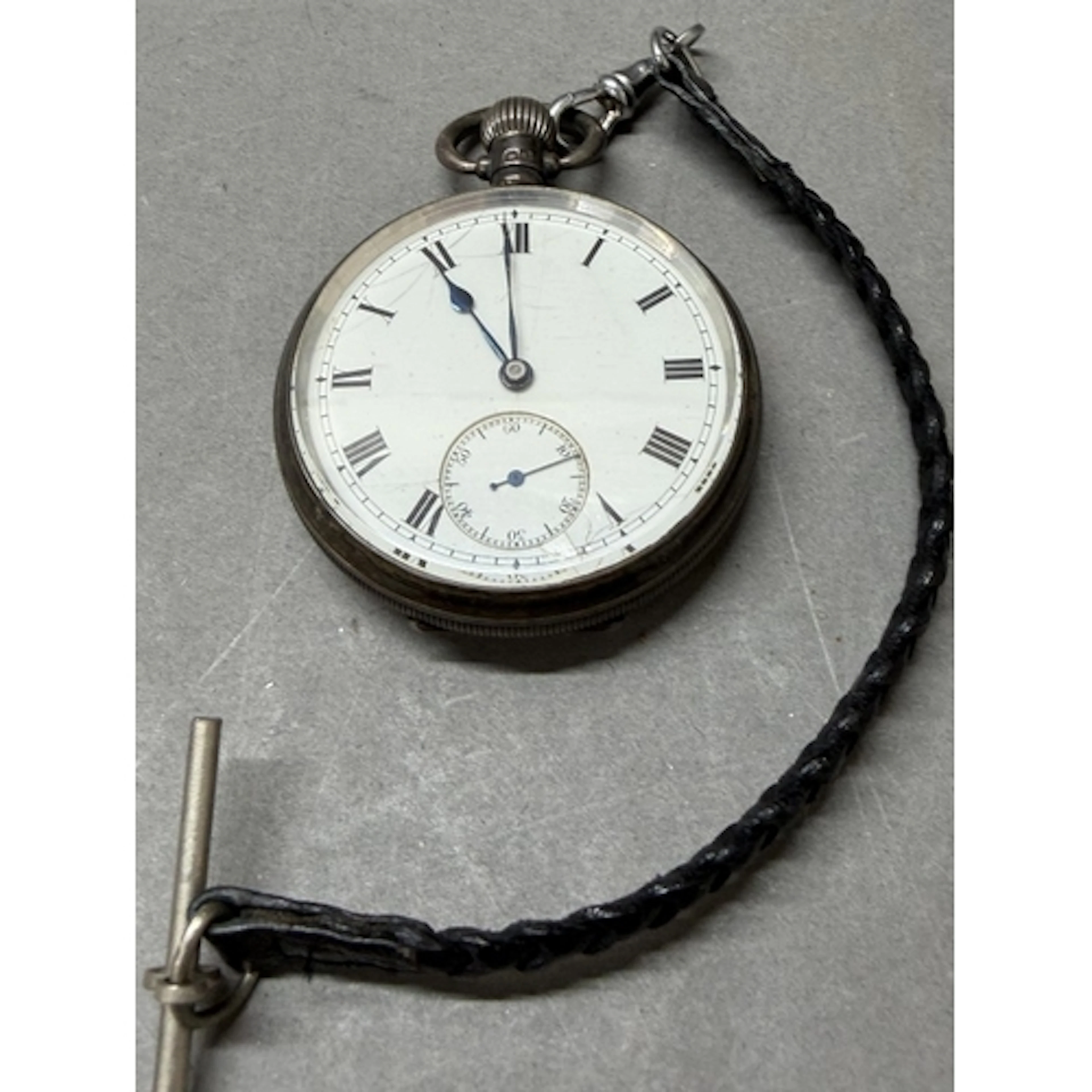 A silver pocket watch hallmarked for Birmingham 1923. Case b...