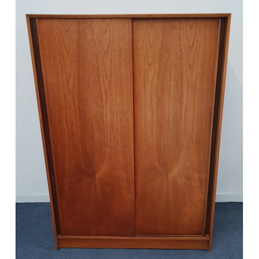 MID-CENTURY AUSTINSUITE TEAK WARDROBE the sliding doors open...