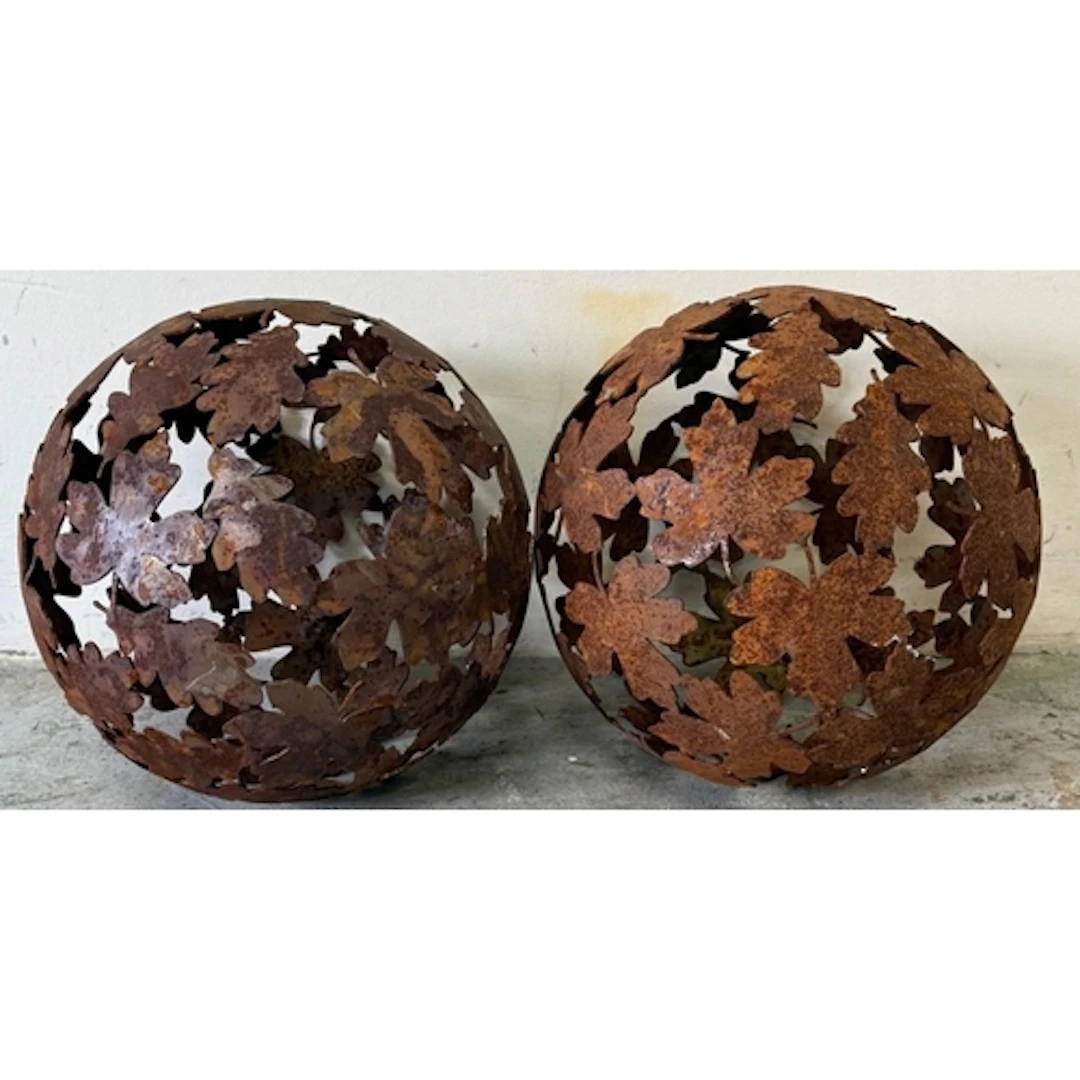 Two decorative metal garden oak leaf spheres. Diameter 30cm...