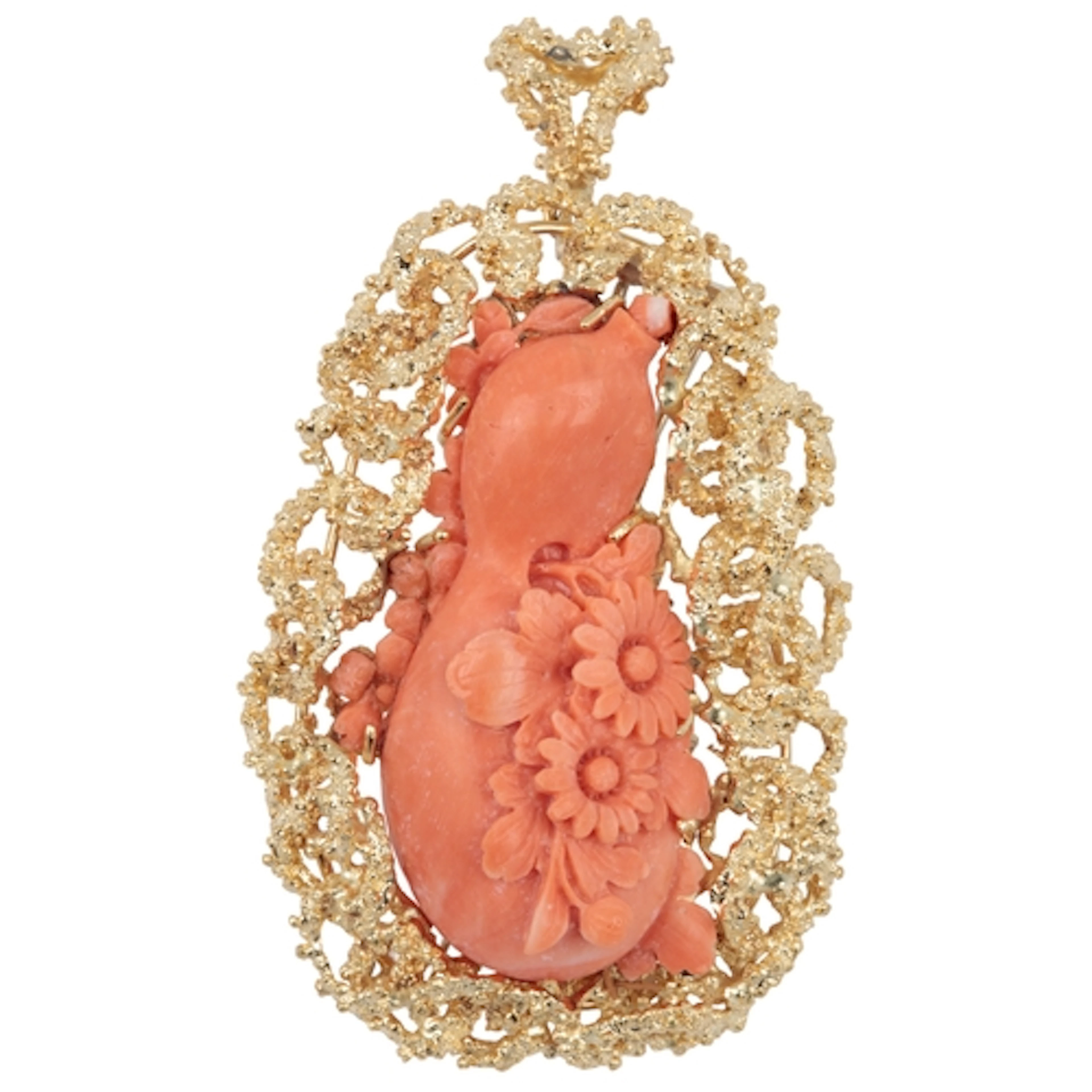 A carved coral and gold pendant/brooch, Italy, 1970s, set wi...