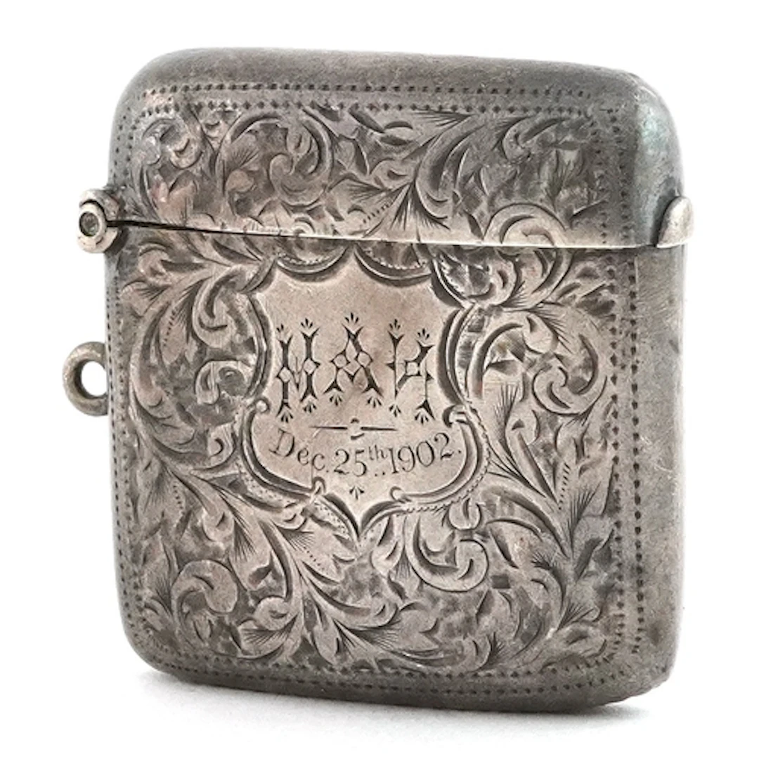 Edwardian floral engraved silver vesta, indistinct maker's m...