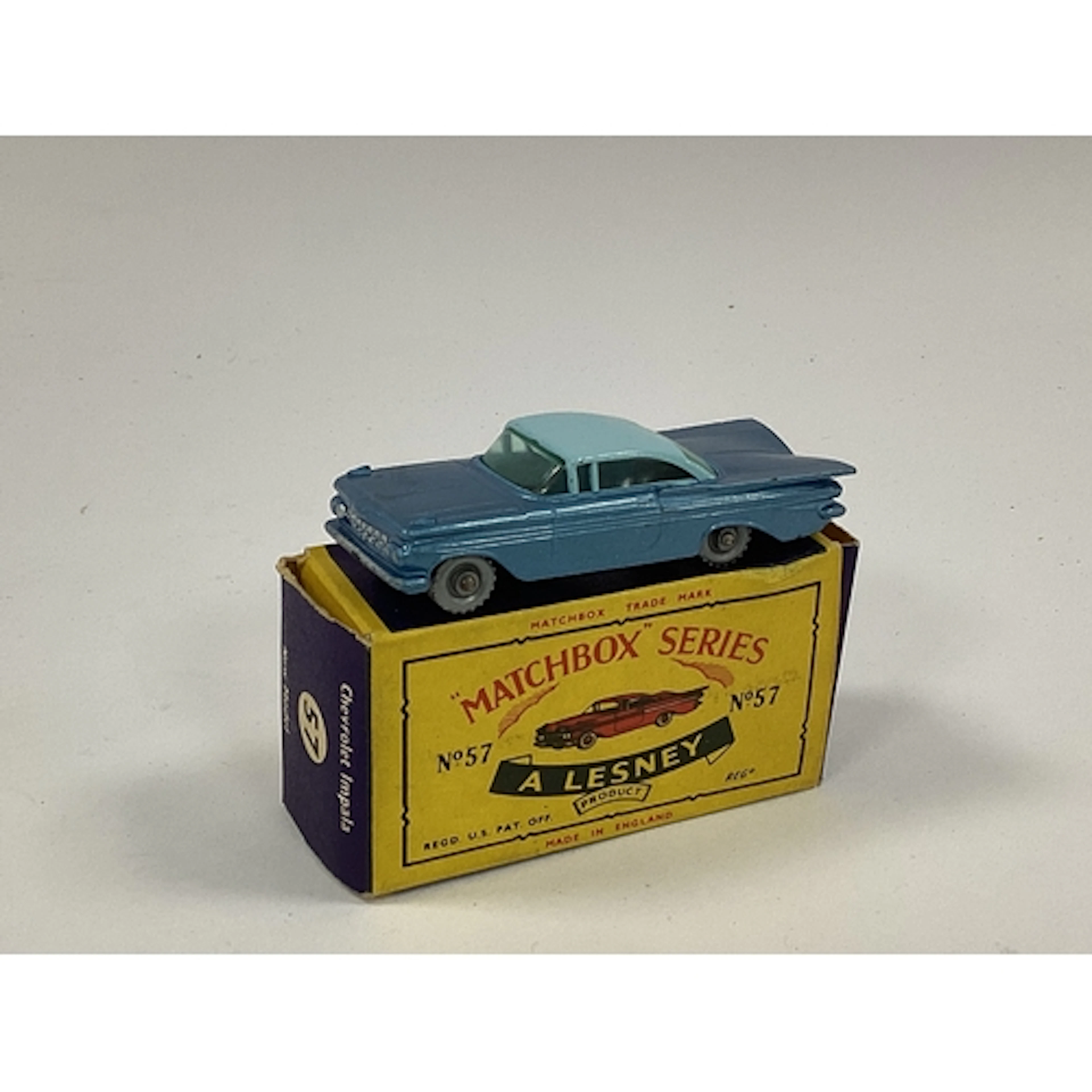 A Lesney Matchbox 1-75 No. 57 Chevrolet Impala. Light blue o...