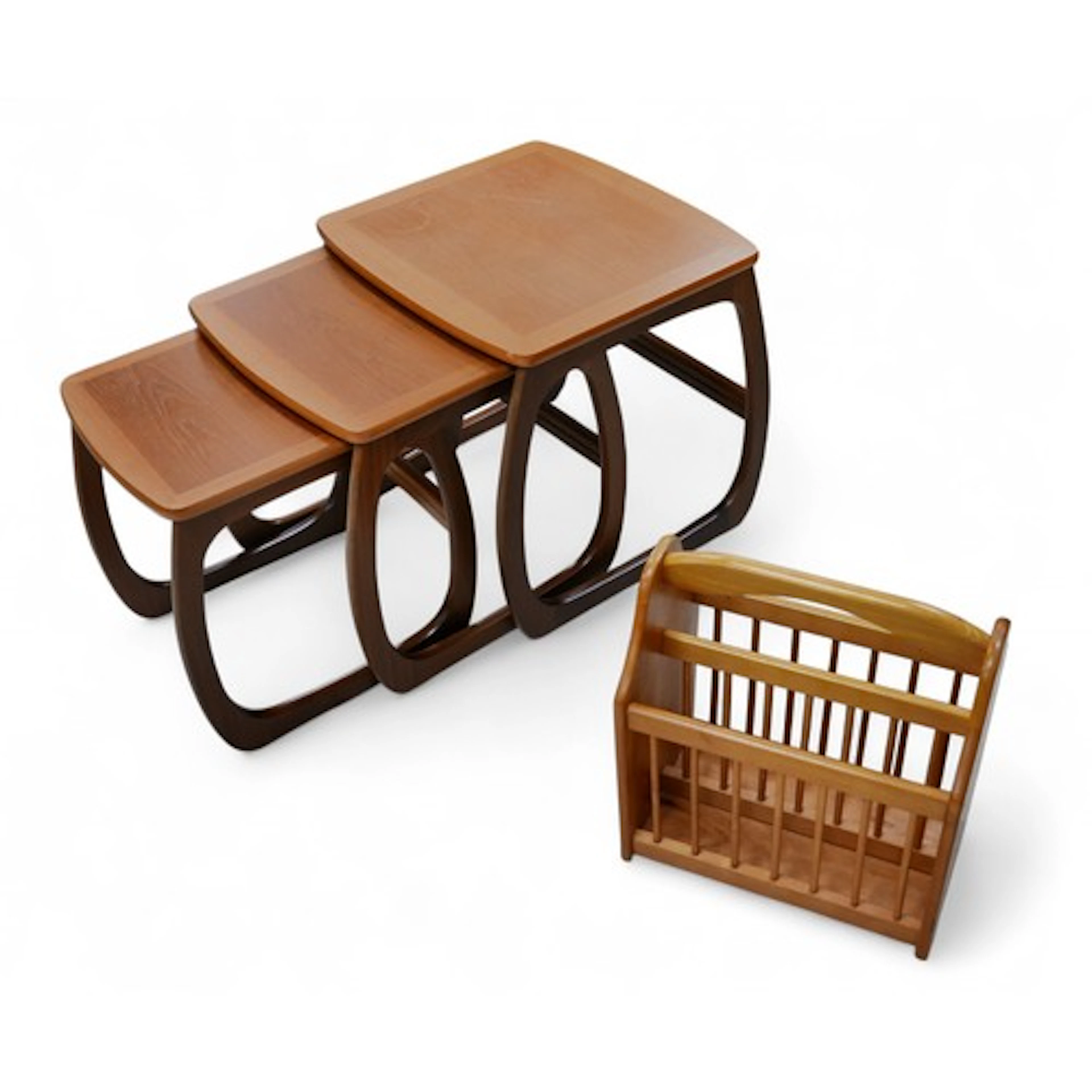 A Parker Knoll nest of three tables, largest, 52.5 by 48 by ...