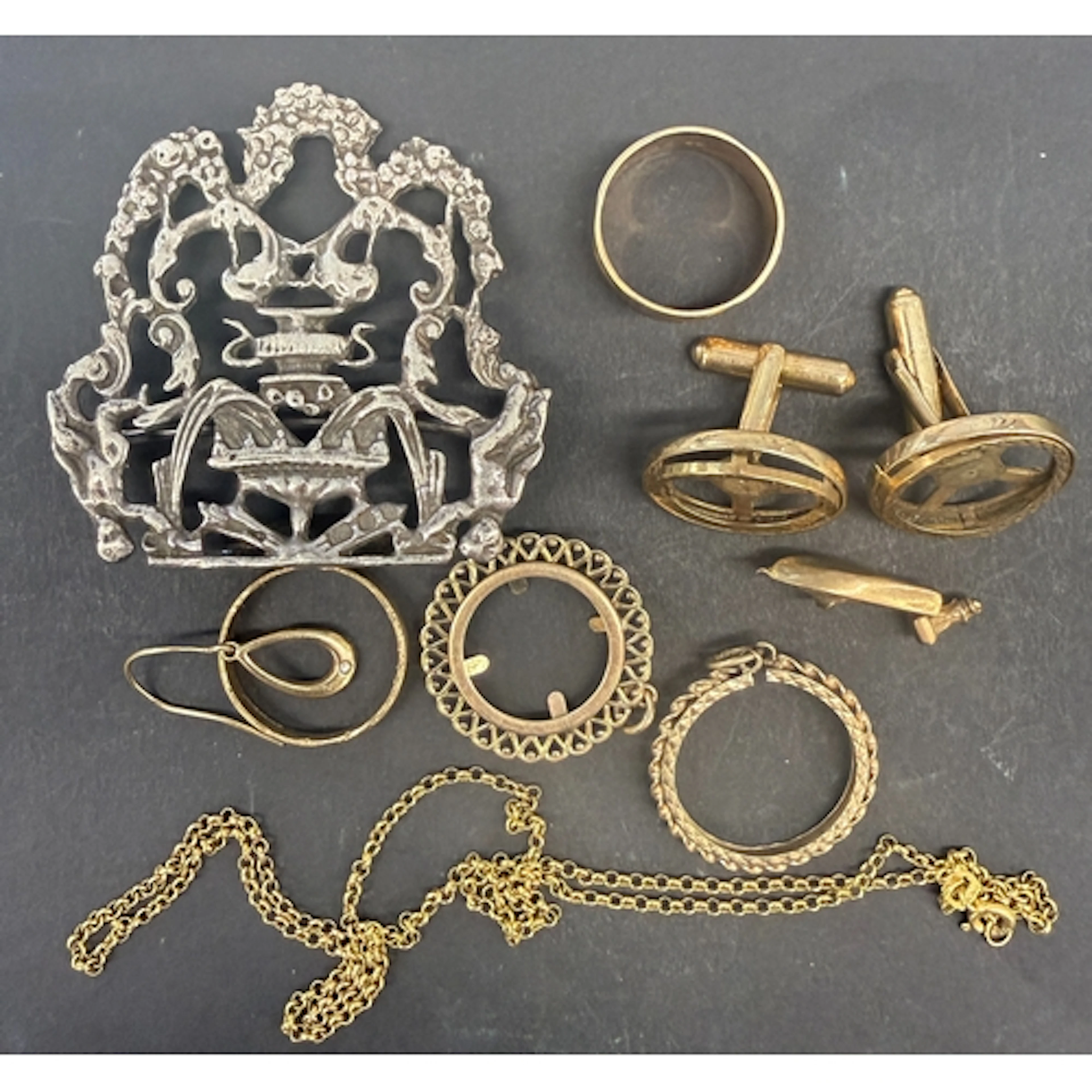 A mixed group of gold and silver jewellery, comprising vario...