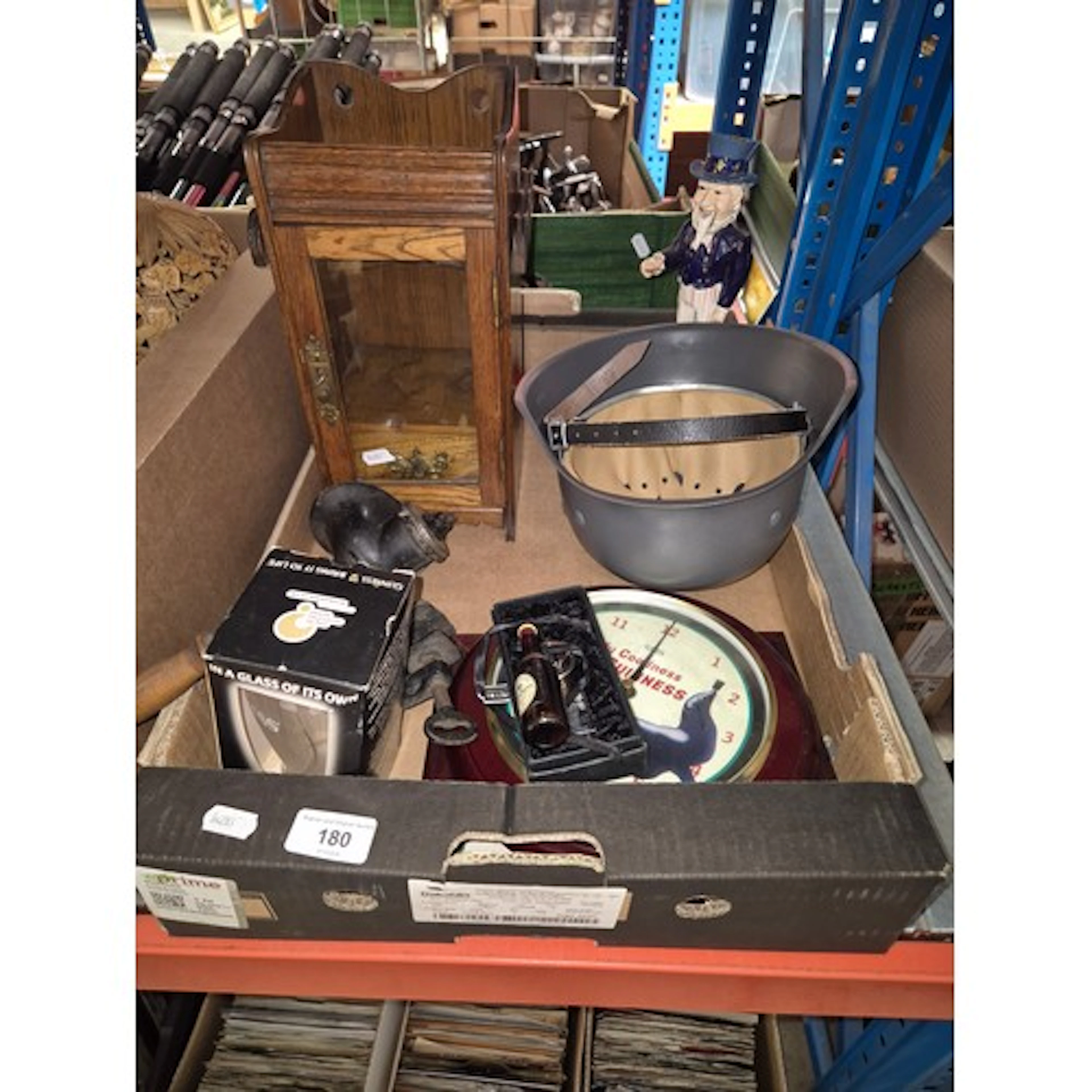 A box of miscellaneous items including a repro German steel ...