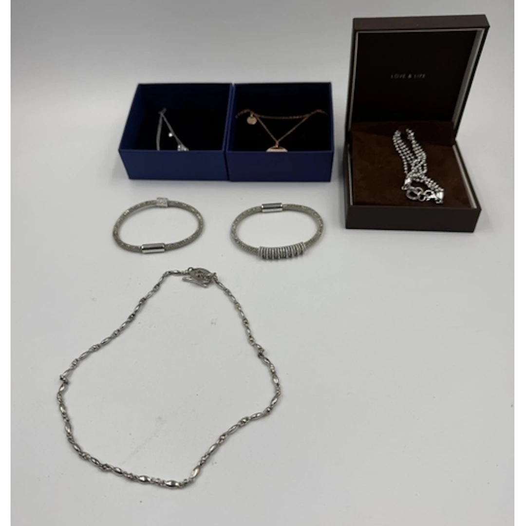 A selection of silver jewellery to include two Swarovski nec...